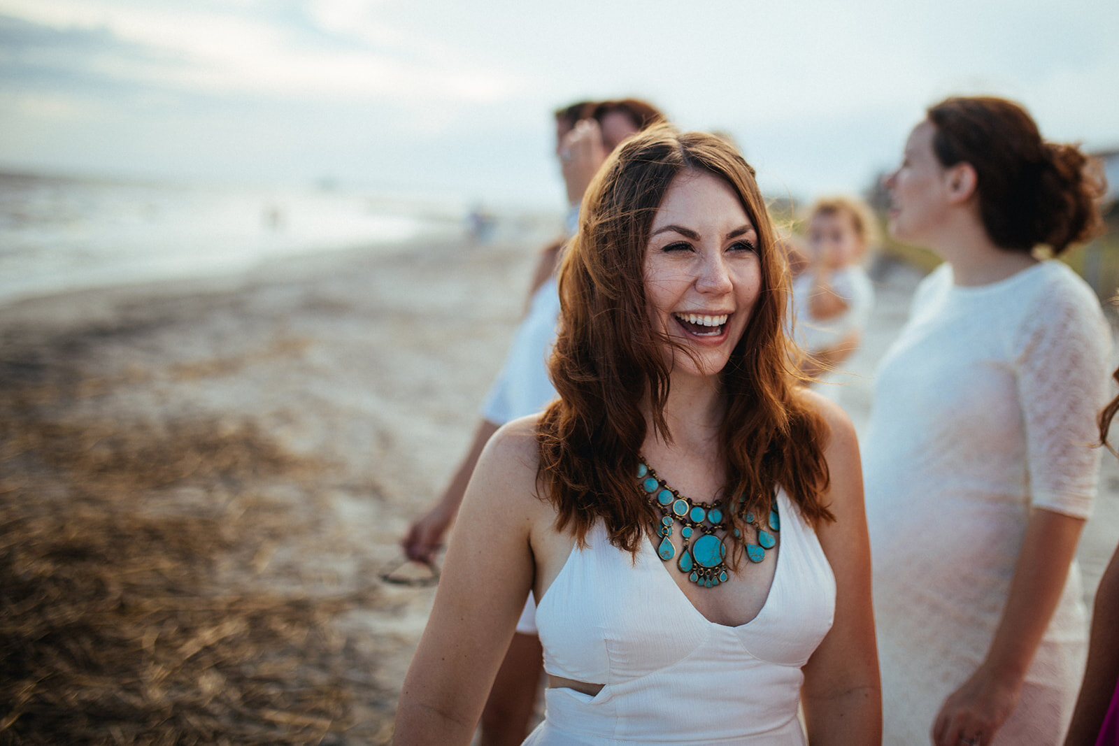 Happy wedding guest on Folly Beach SC Shawnee Custalow photography