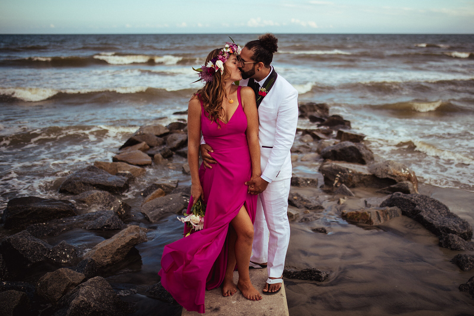 Newlyweds kissing on Folly Beach SC Shawnee Custalow photography
