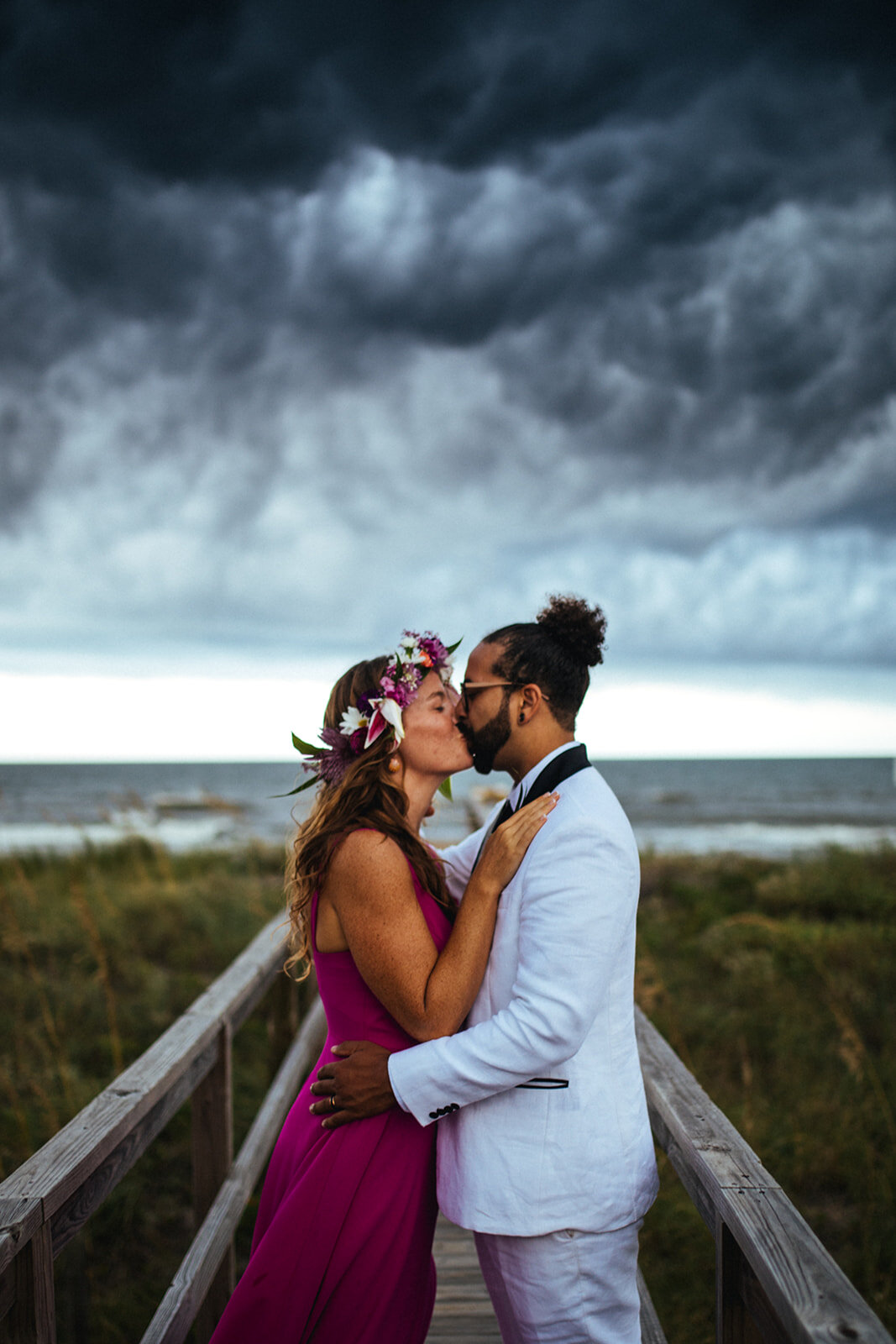 Newlyweds kissing by Folly Beach SC Shawnee Custalow photography