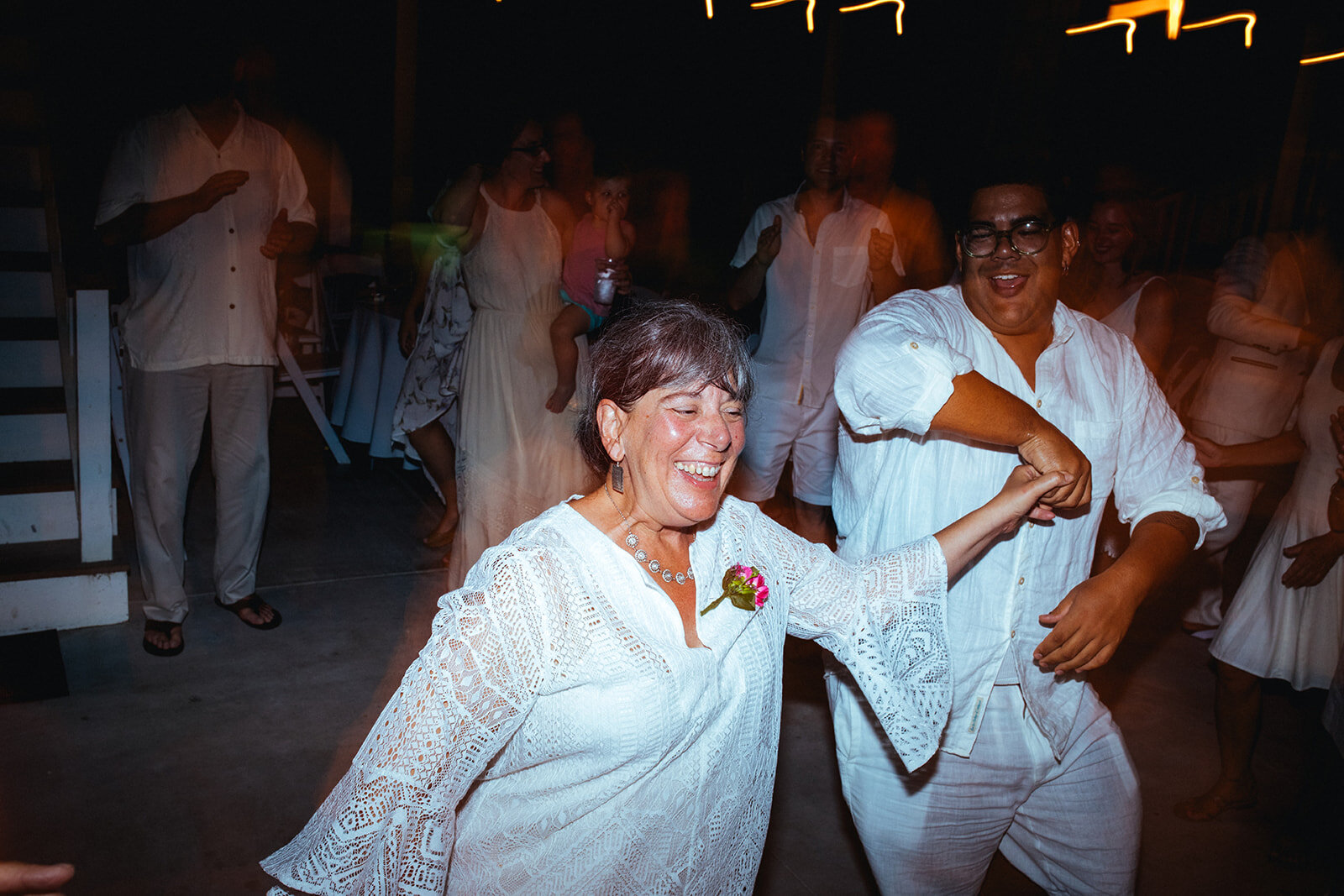 Wedding guests dancing at Folly Beach SC Shawnee Custalow photography