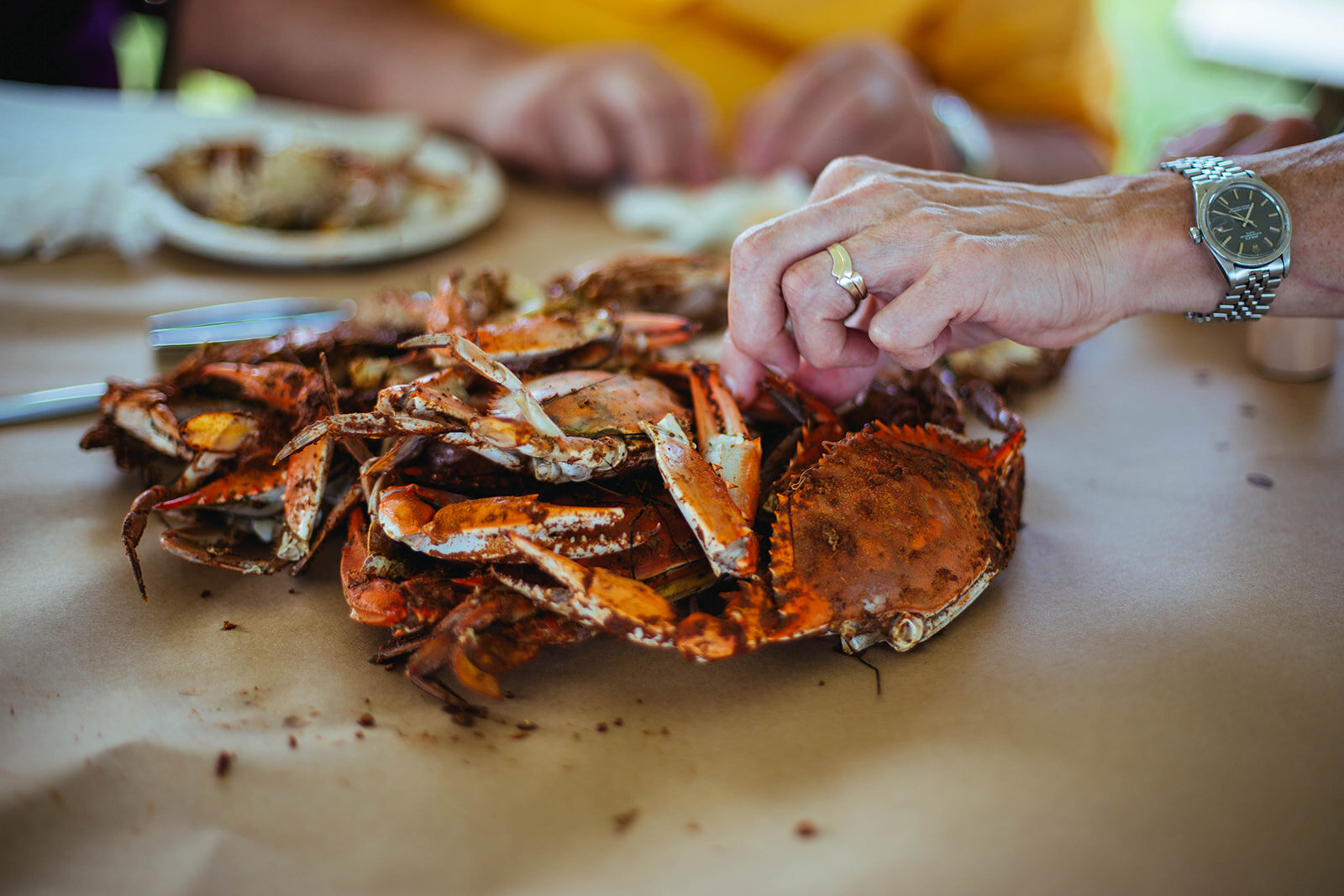 Crab feast at rehearsal dinner in Tilghman Island MD Shawnee Custalow photography