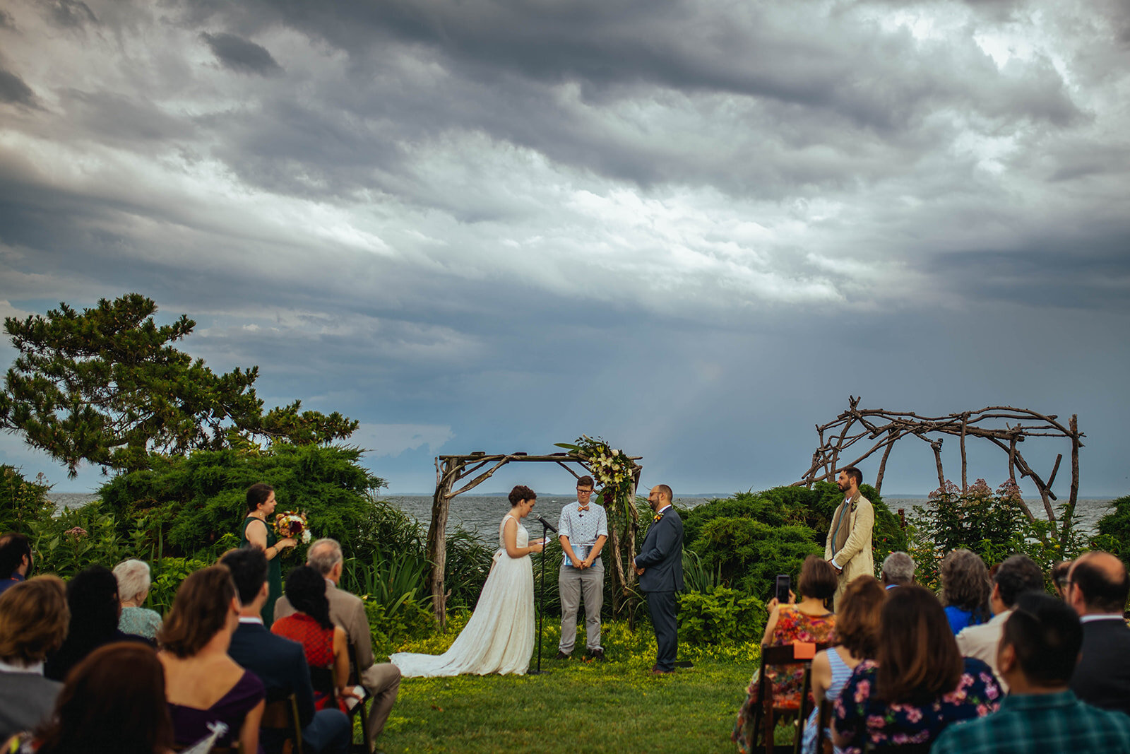 Wedding ceremony on Tilghman Island MD Shawnee Custalow queer wedding photography