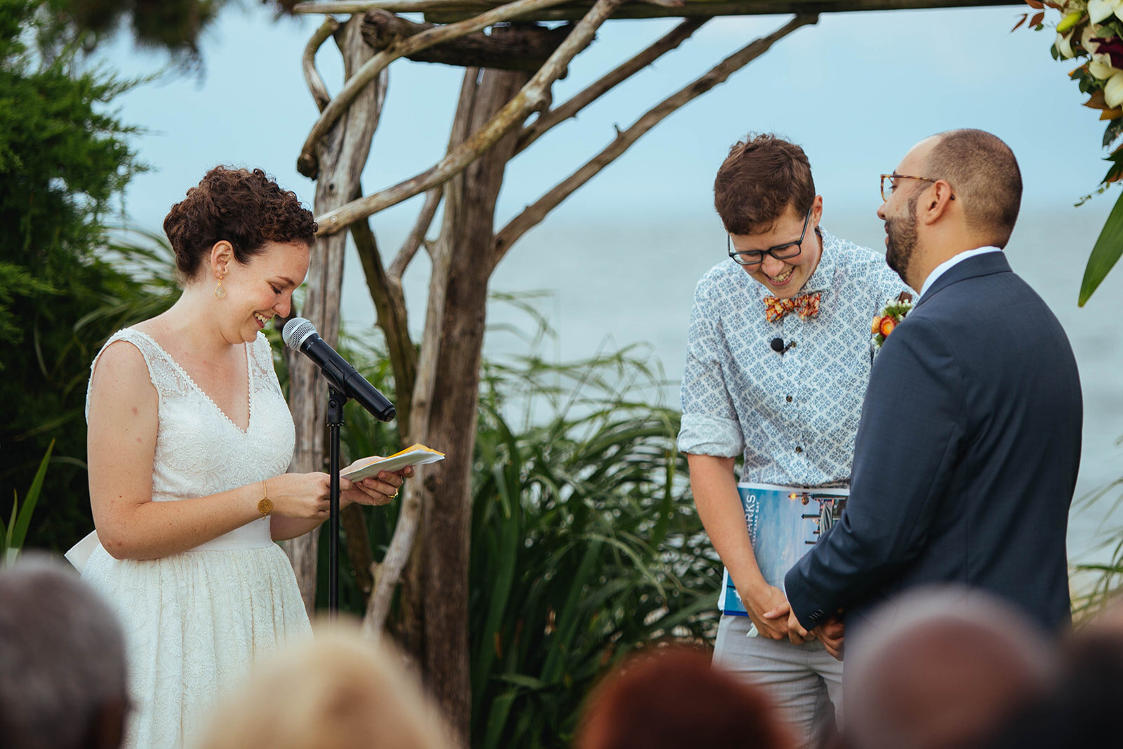 Bride reading vows to groom on Tilghman Island MD Shawnee Custalow photography