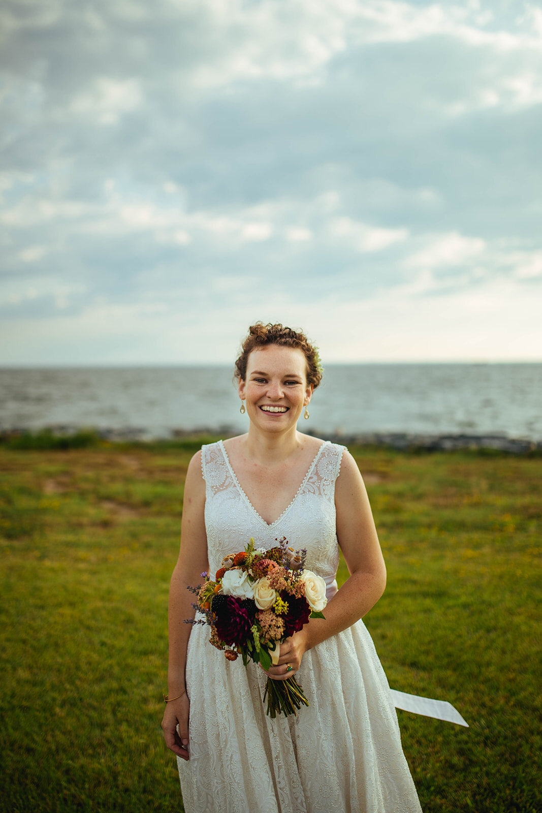 Newlywed bride with a bouquet on Tilghman Island MD Shawnee Custalow photography