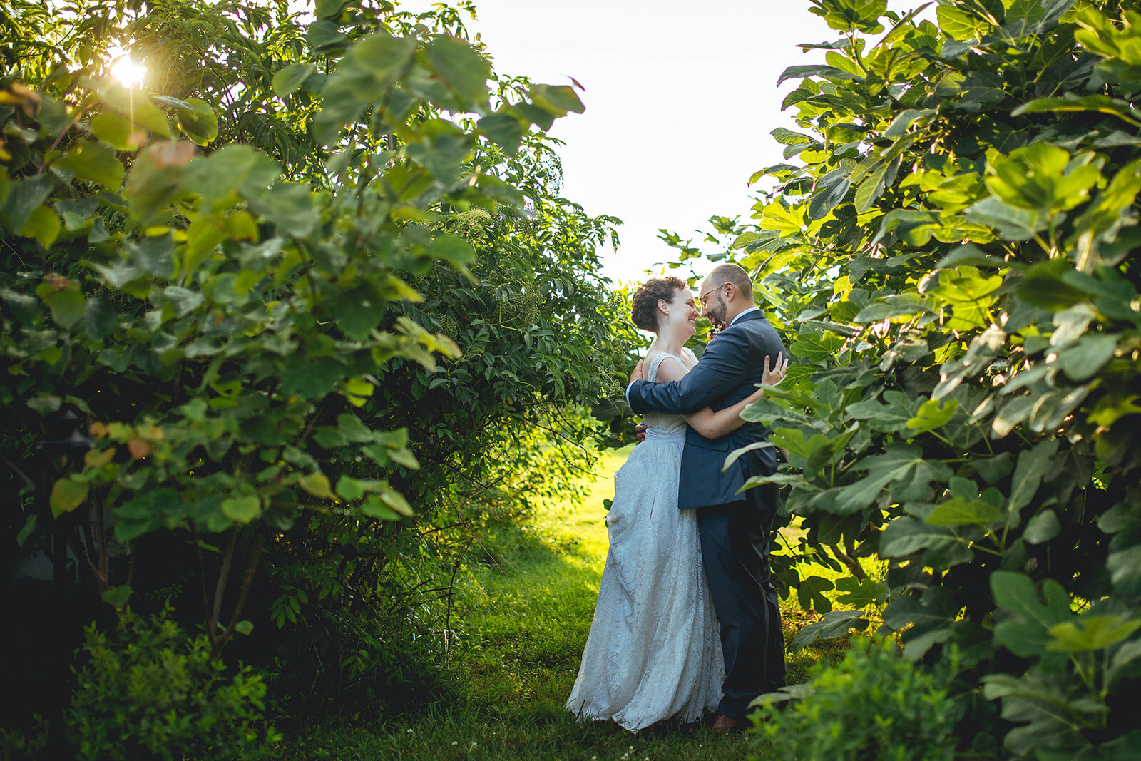 Newlyweds lean in to kiss on Tilghman Island MD Shawnee Custalow wedding photography