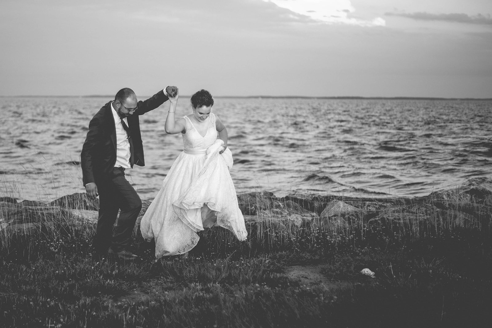 Newlyweds walking by the sea on Tilghman Island MD Shawnee Custalow photography