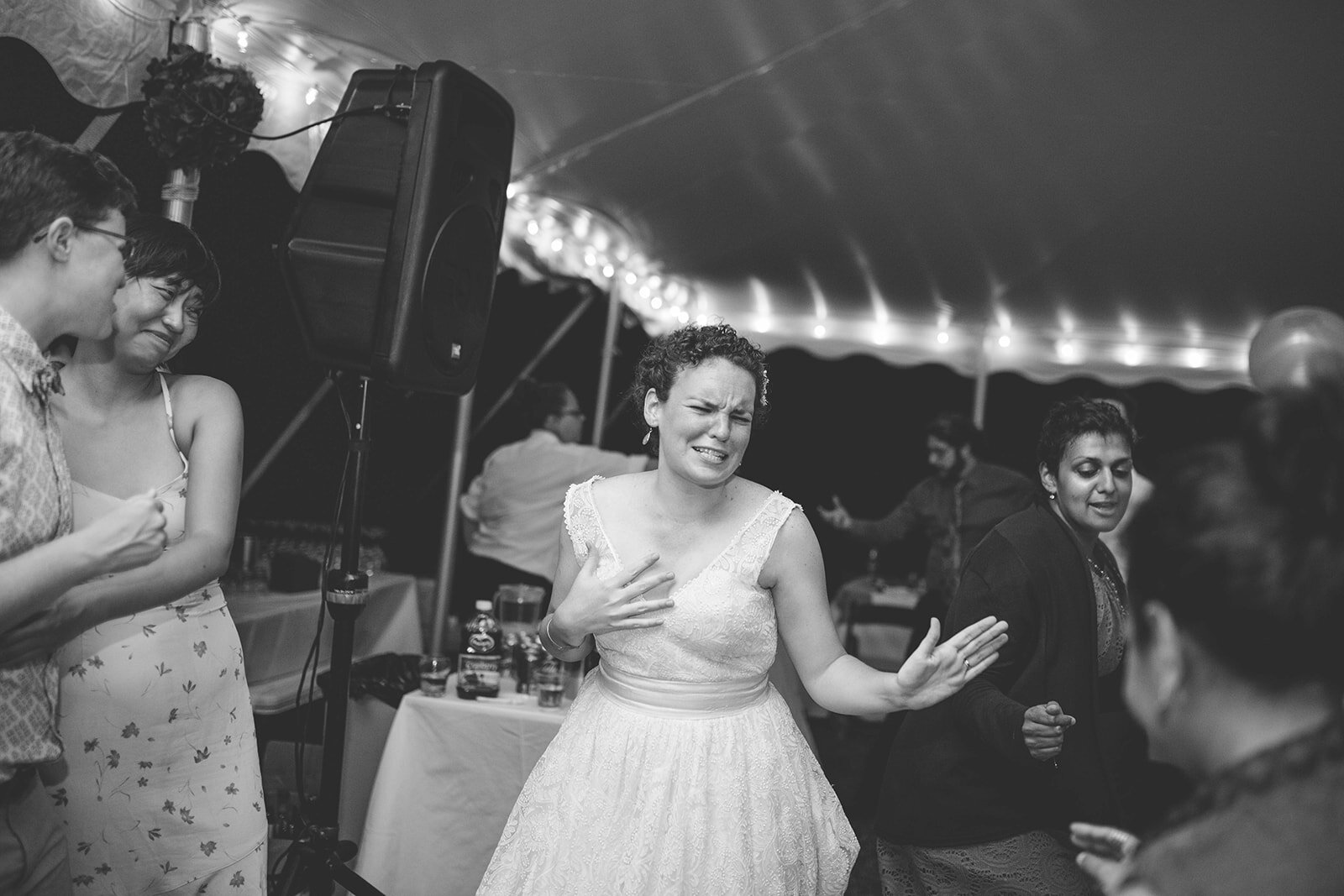 Bride dancing passionately at Black Walnut Point Inn MD Shawnee Custalow photography