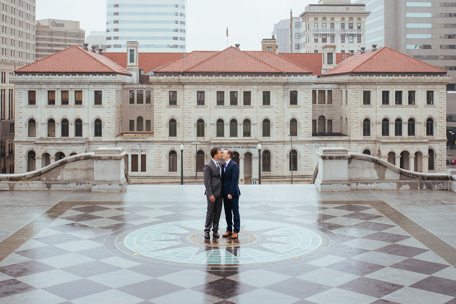 LGBTQ grooms kissing outside the Richmond VA Capitol Building Shawnee Custalow photography