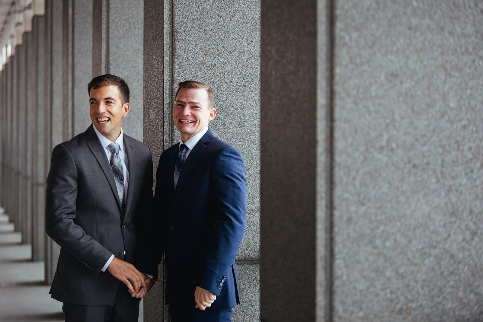 Happy LGBTQ newlyweds at RVA City Hall Shawnee Custalow queer wedding photographer