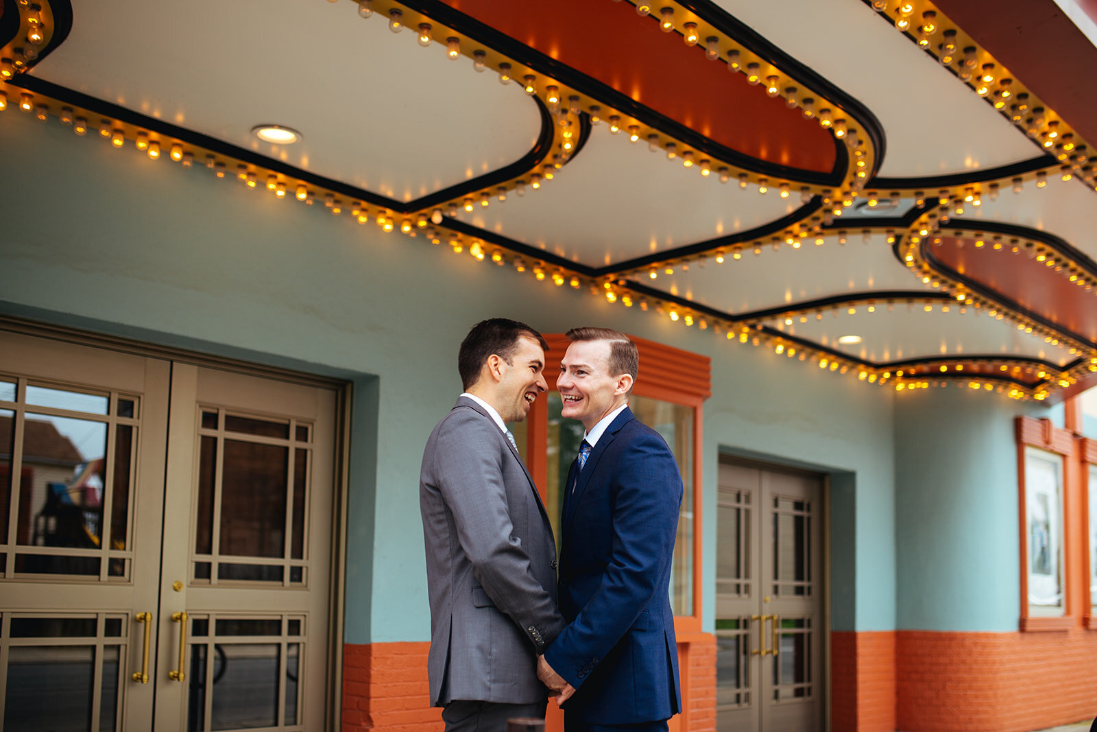 LGBTQ newlyweds outside the Robinson Theater RVA Shawnee Custalow wedding photography