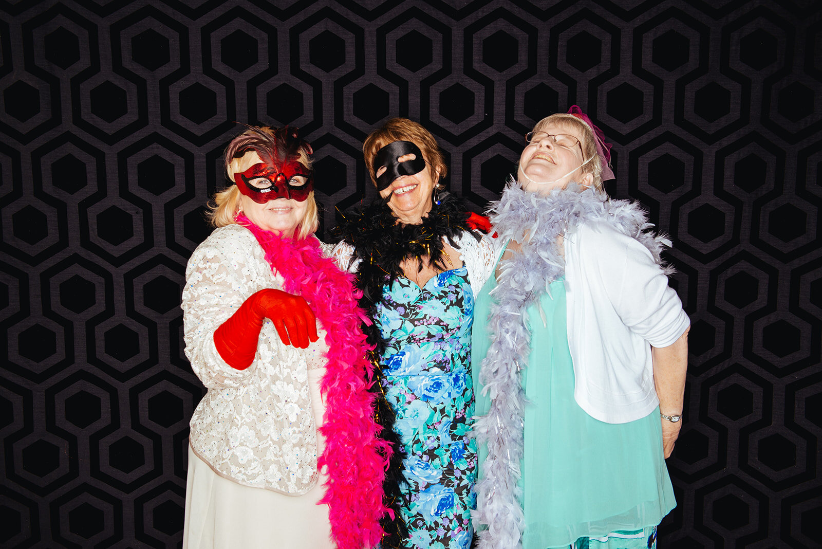 Wedding guests with props in a photobooth in Richmond VA Shawnee Custalow photography