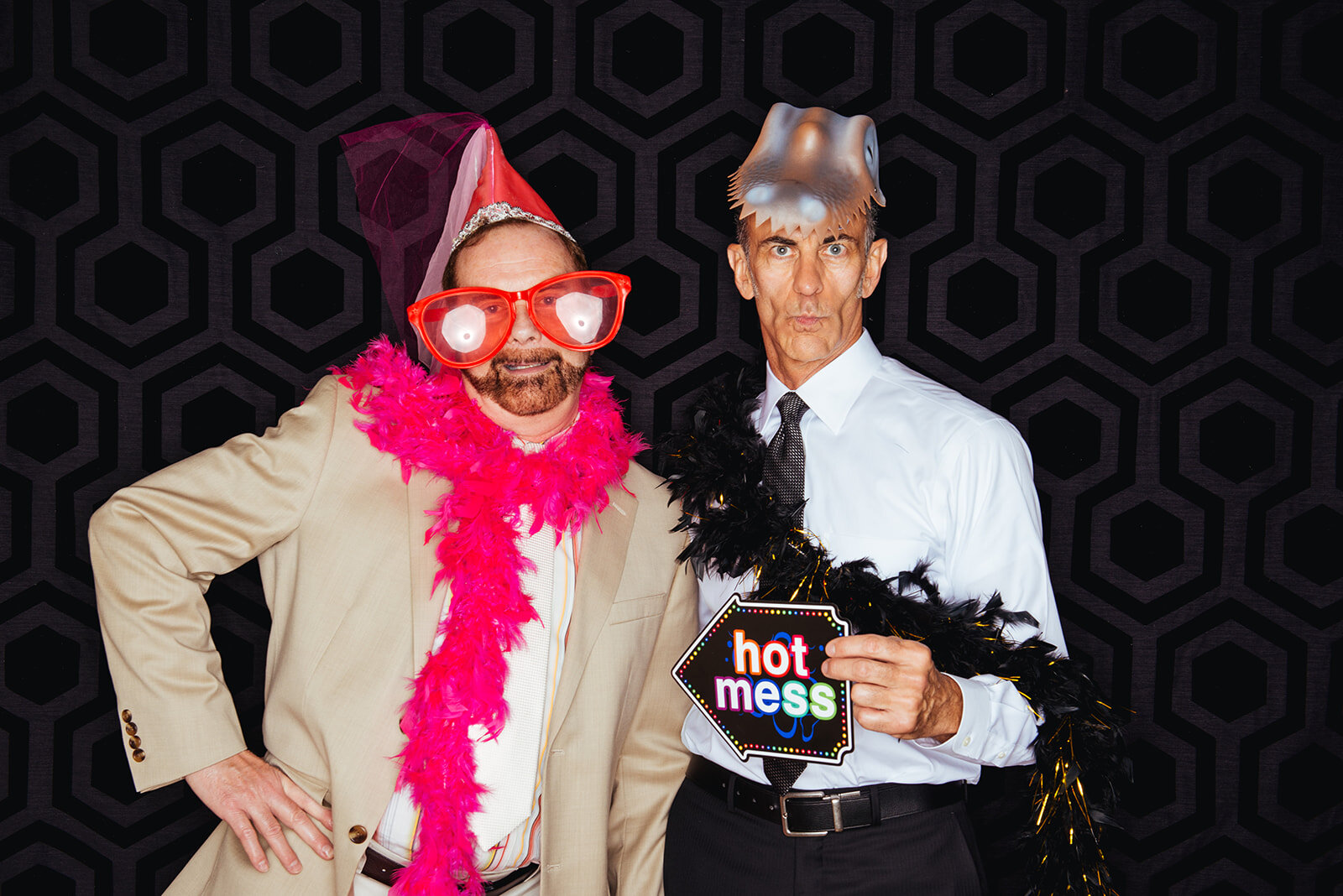 Wedding guests with props in a photobooth in Richmond VA Shawnee Custalow photography