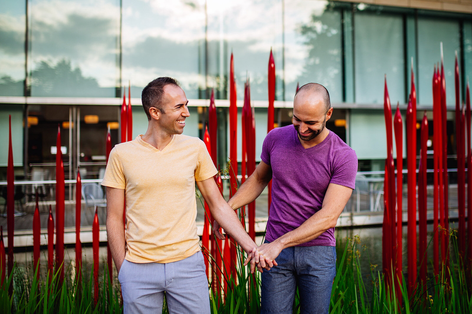Queer couple holding hands outside the VMFA Richmond Shawnee Custalow photographer