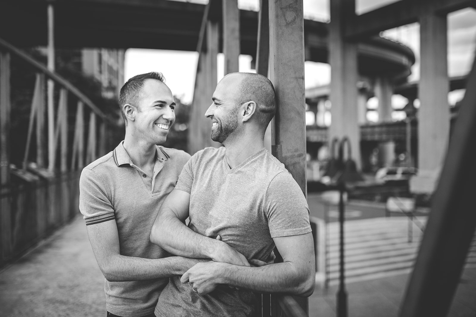 LGBTQ couple embracing in Shockoe Bottom Richmond VA Shawnee Custalow photography