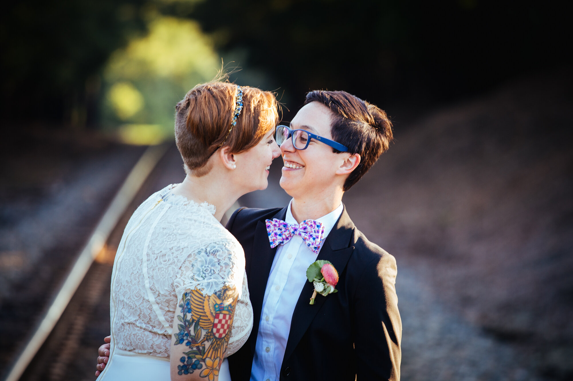 LGBTQ newlyweds lean in to kiss in Richmond VA Shawnee Custalow wedding photography