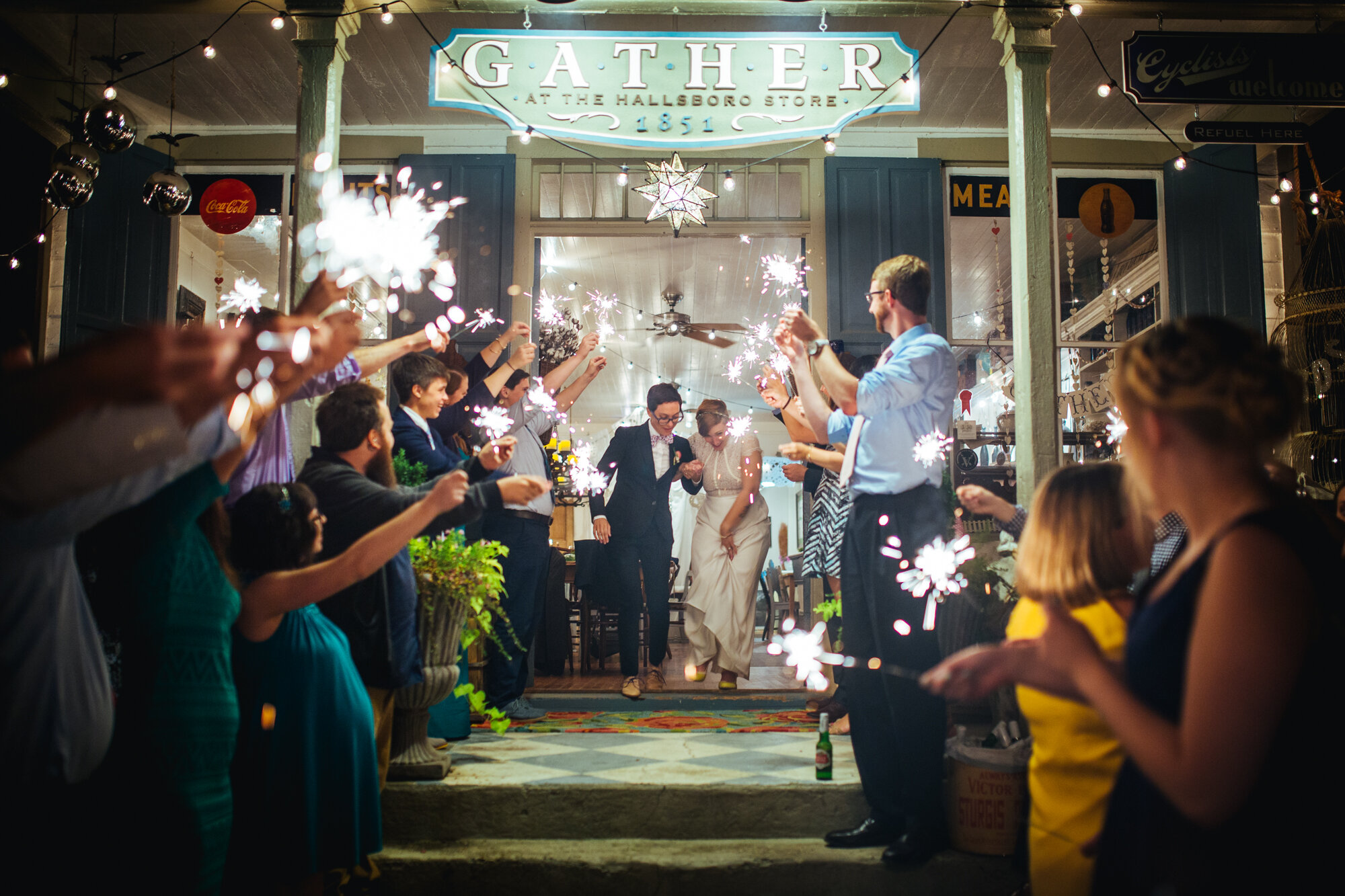 Newlyweds exiting through sparklers at Gather at the Hallsboro Store VA Shawnee Custalow photo