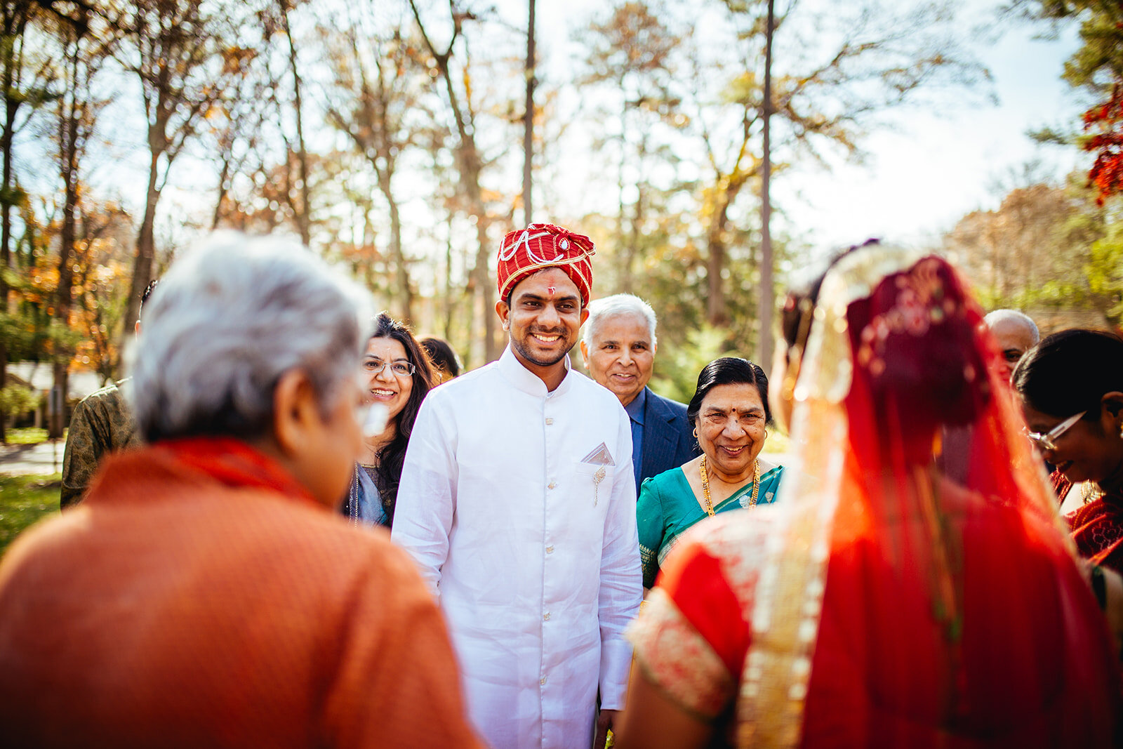 Indian groom greeting his bride in Richmond VA Shawnee Custalow queer wedding photographer