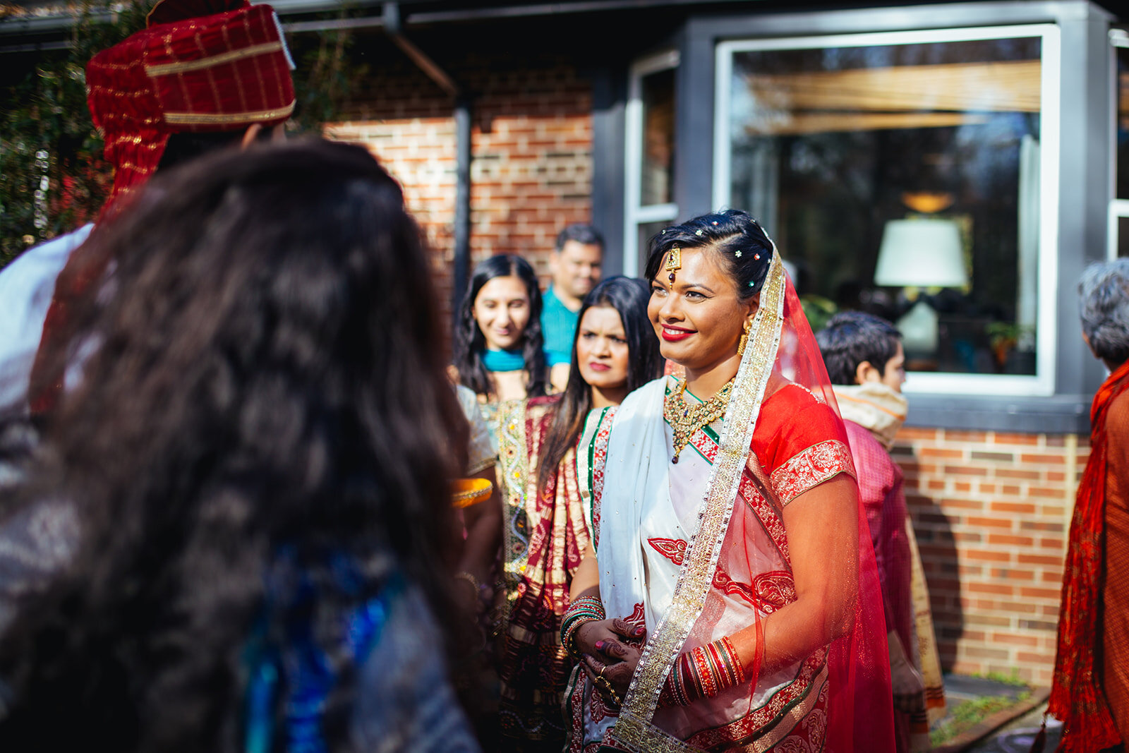Indian Bride smiling at the groom in Richmond VA Shawnee Custalow wedding photography