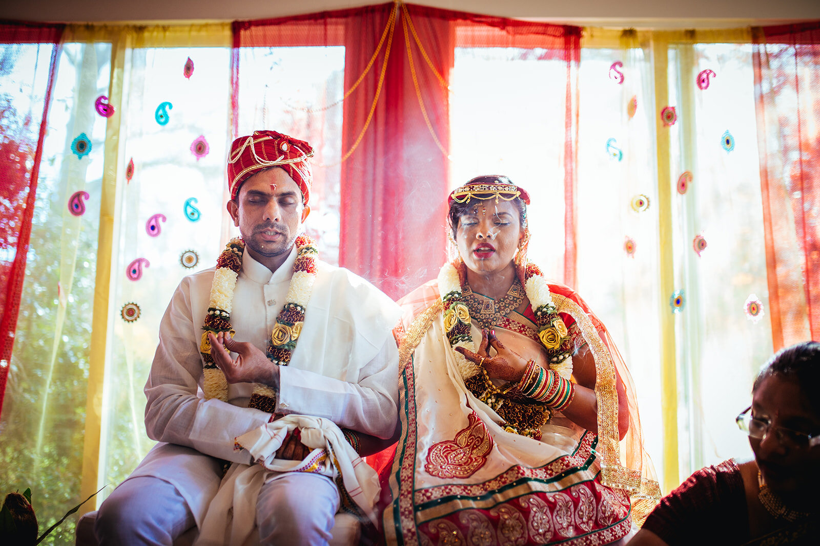 Indian Bride and groom praying at wedding ceremony in RVA Shawnee Custalow photography