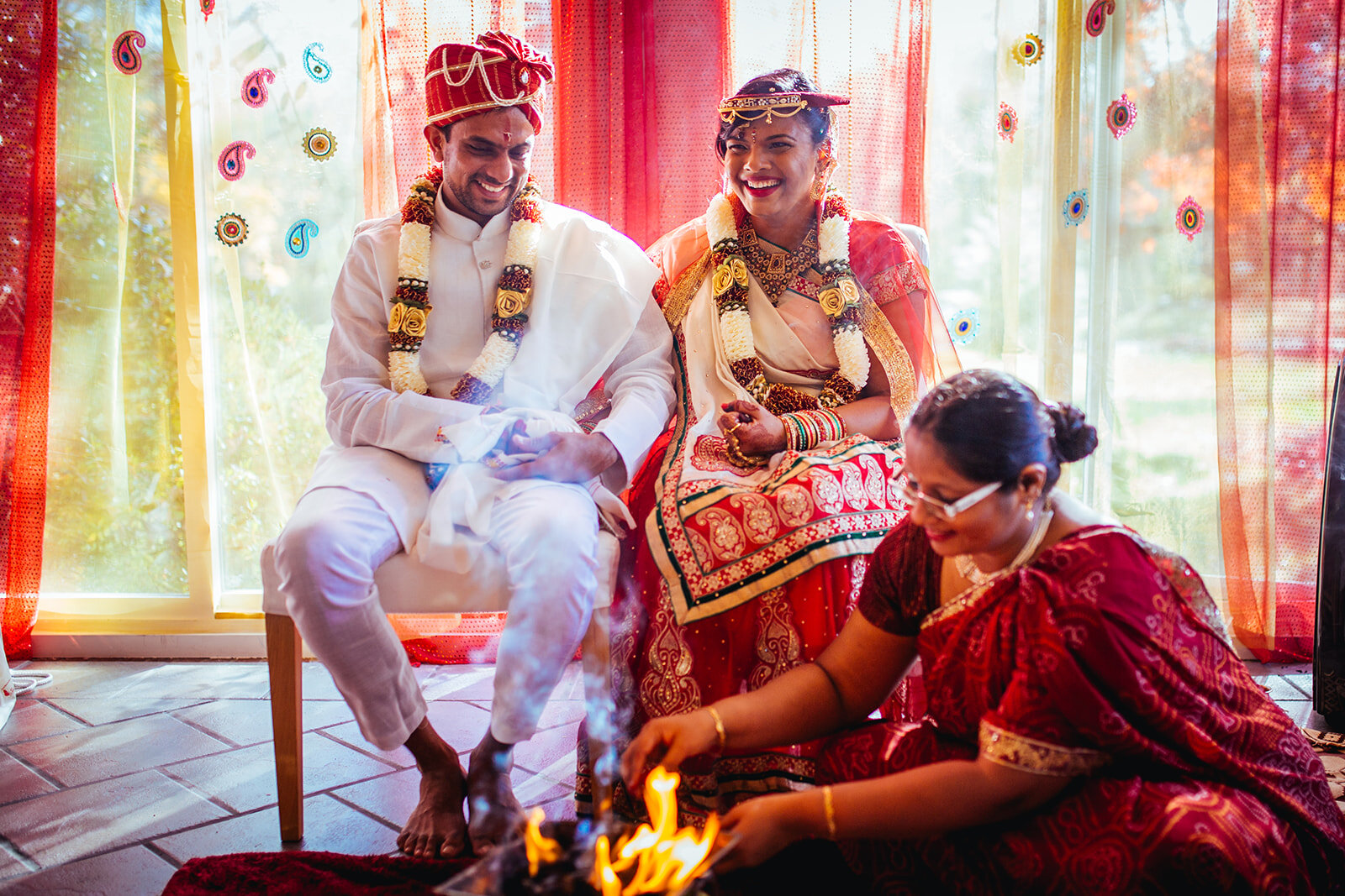 Indian bride and groom getting married by ceremonial fire in RVA Shawnee Csutalow photography
