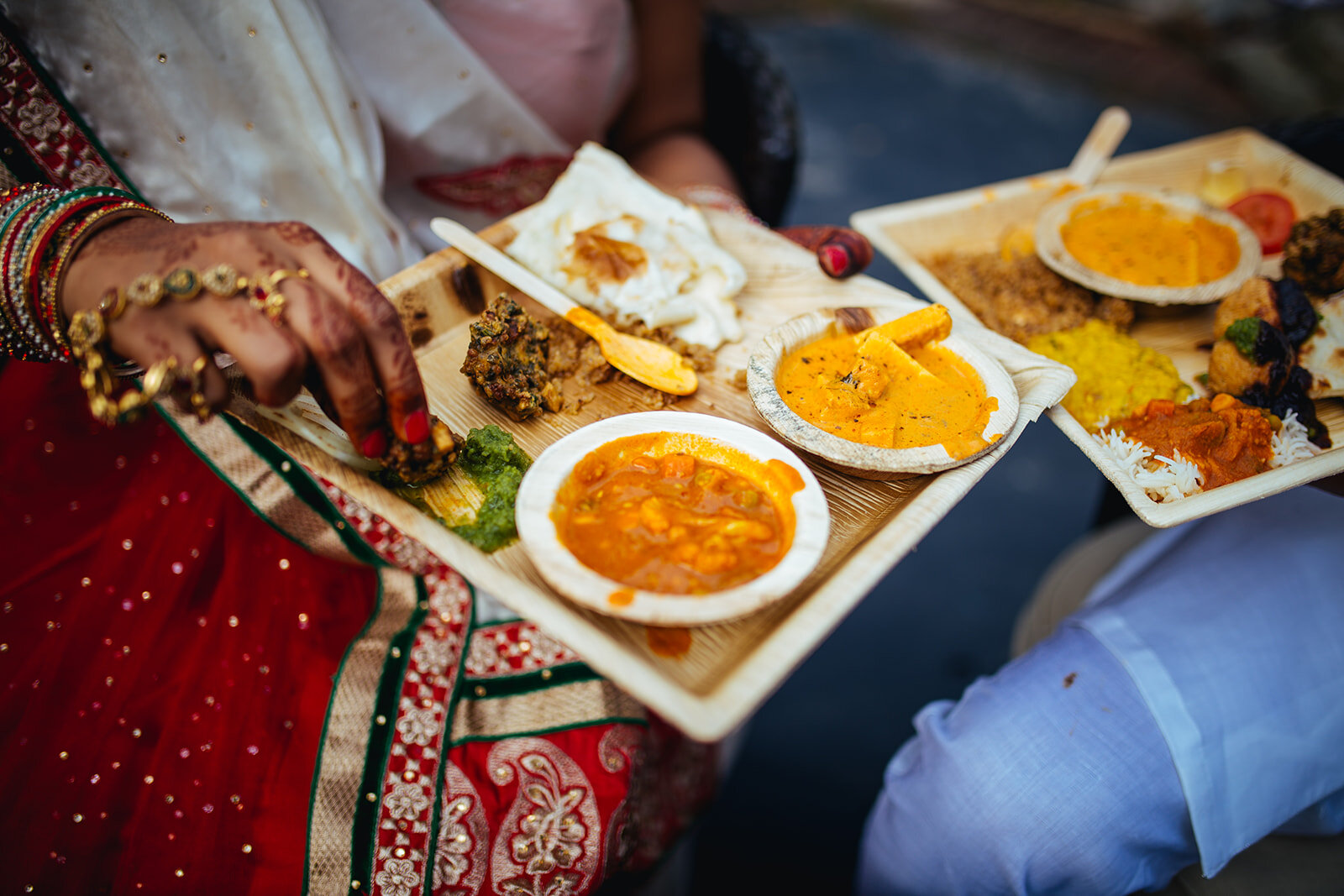 Indian food on disposable plates at Richmond VA wedding Shawnee Custalow photography