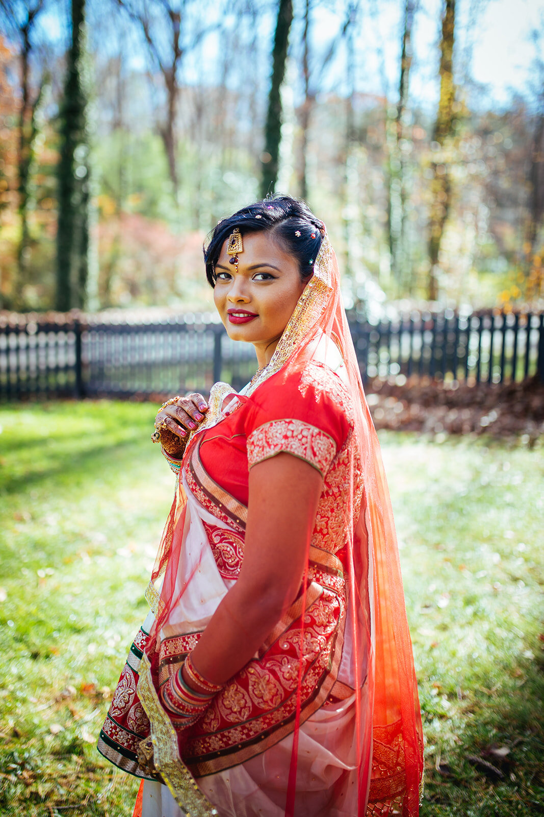 Indian Bride wearing a red sari in Richmond VA Shawnee Custalow wedding photographer