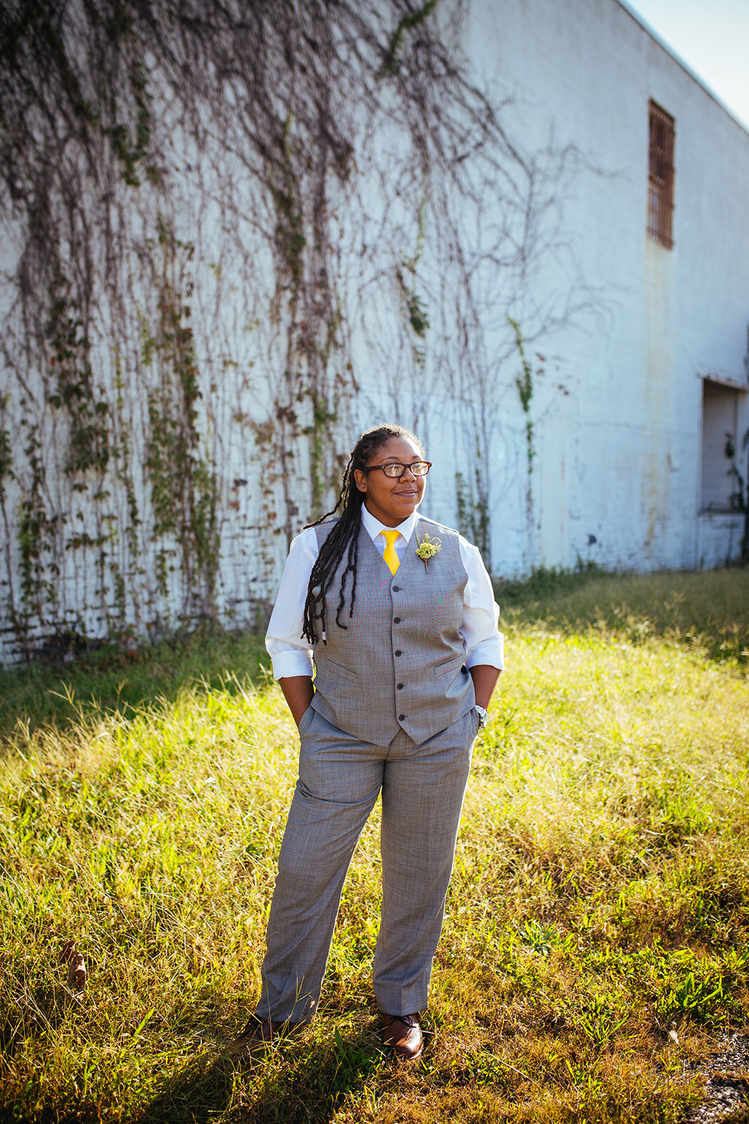 Newlywed in grey suit vest and pants in Norfolk VA Shawnee Custalow photography