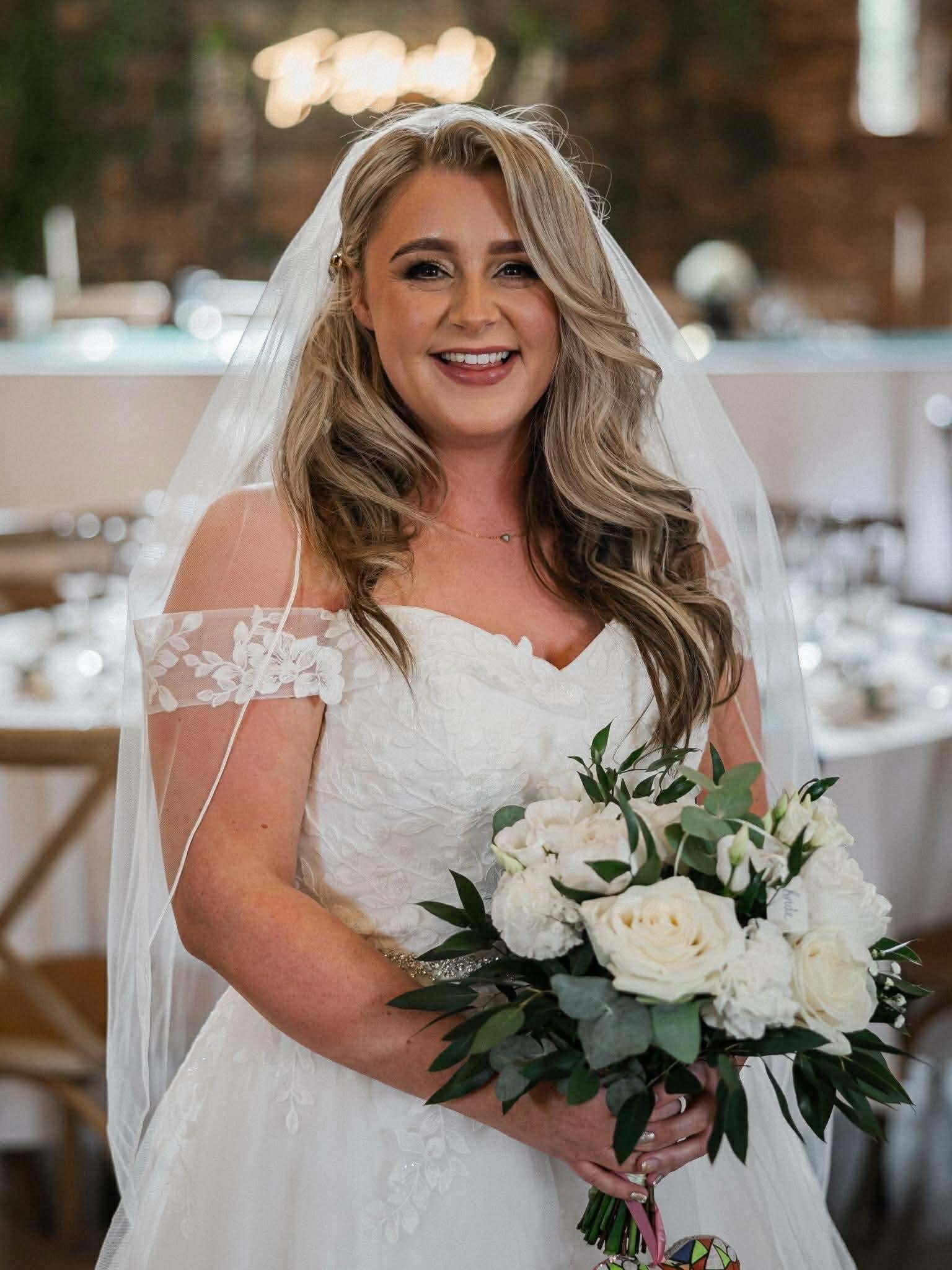 Natural bridal makeup with soft waves by South Wales bridal makeup artist Lowri Makeup Artist