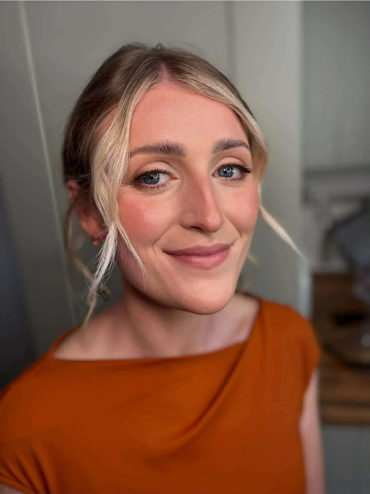 Soft glam occasion makeup on a client featuring natural definition and glowing skin,  with a testimonial from a South Wales makeup client