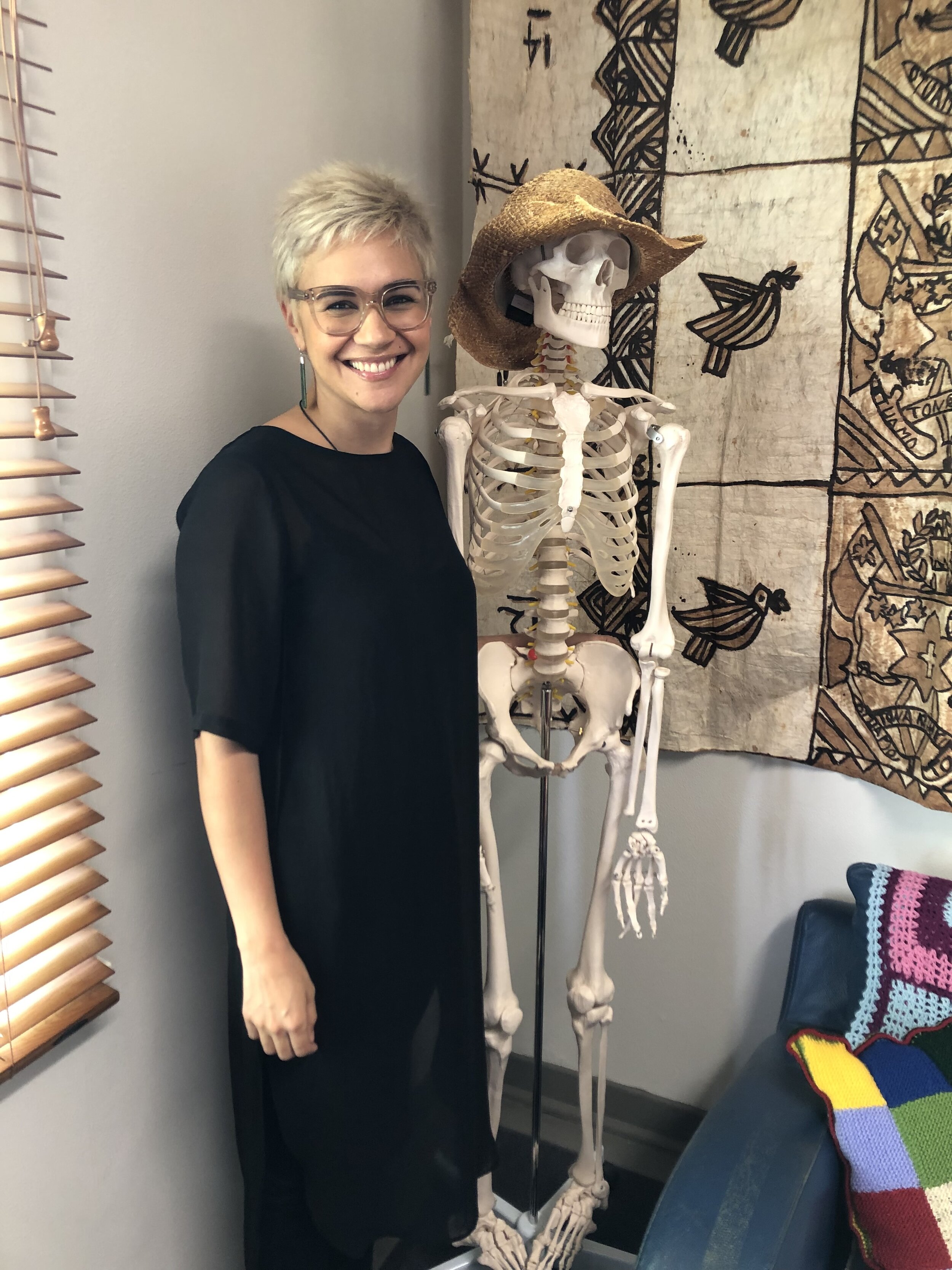 Noelle McCarthy photo Emma with skeleton - Emma Espiner.jpg