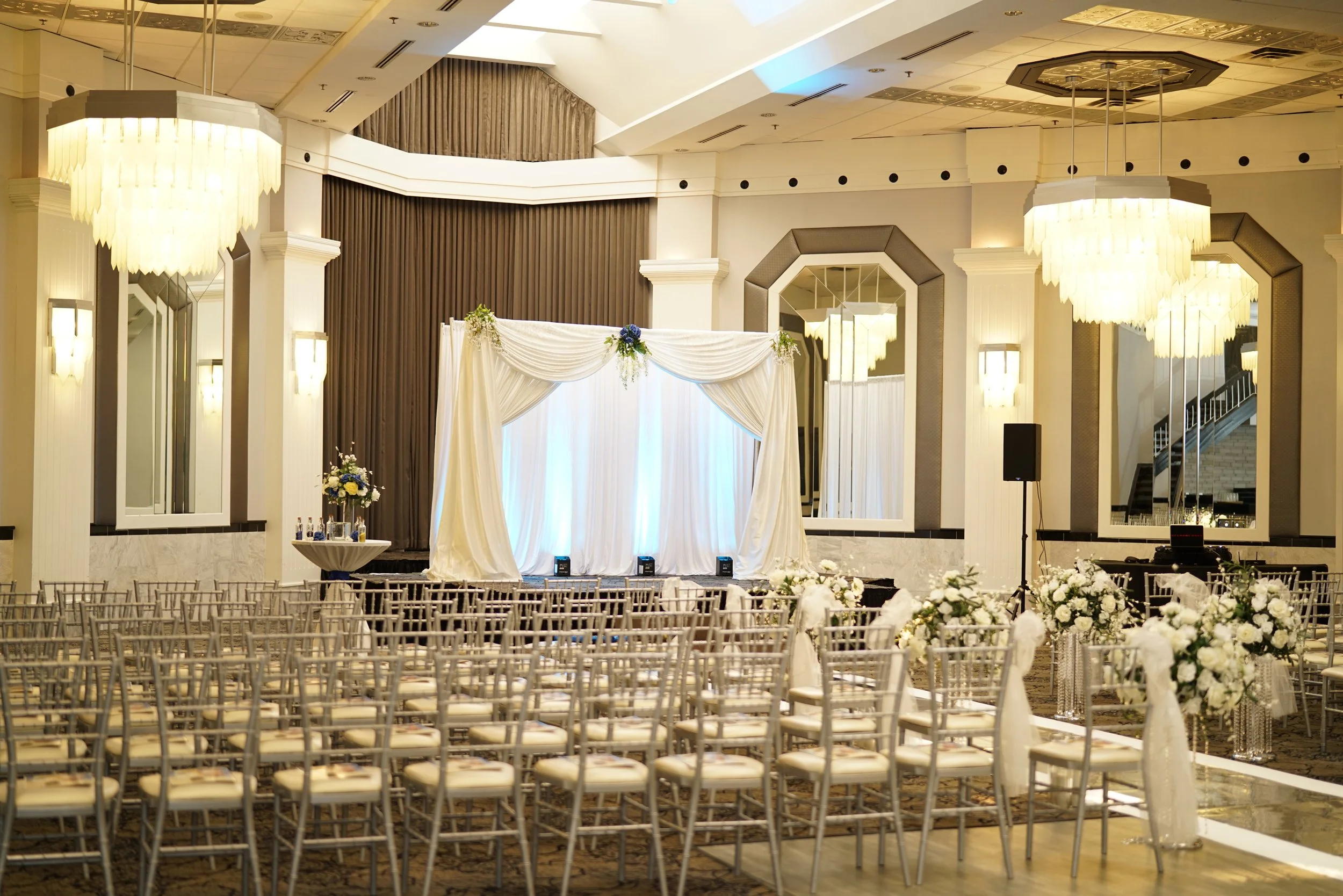 elegant ceremony, drapery, aisle floral pieces, candle cylinders, 