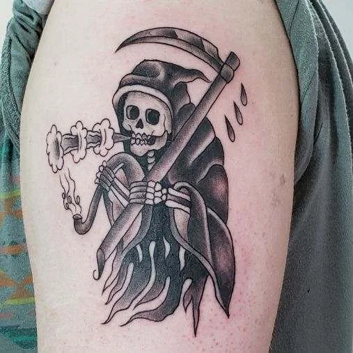 Tattoo of Grim Reaper with scythe and pipe