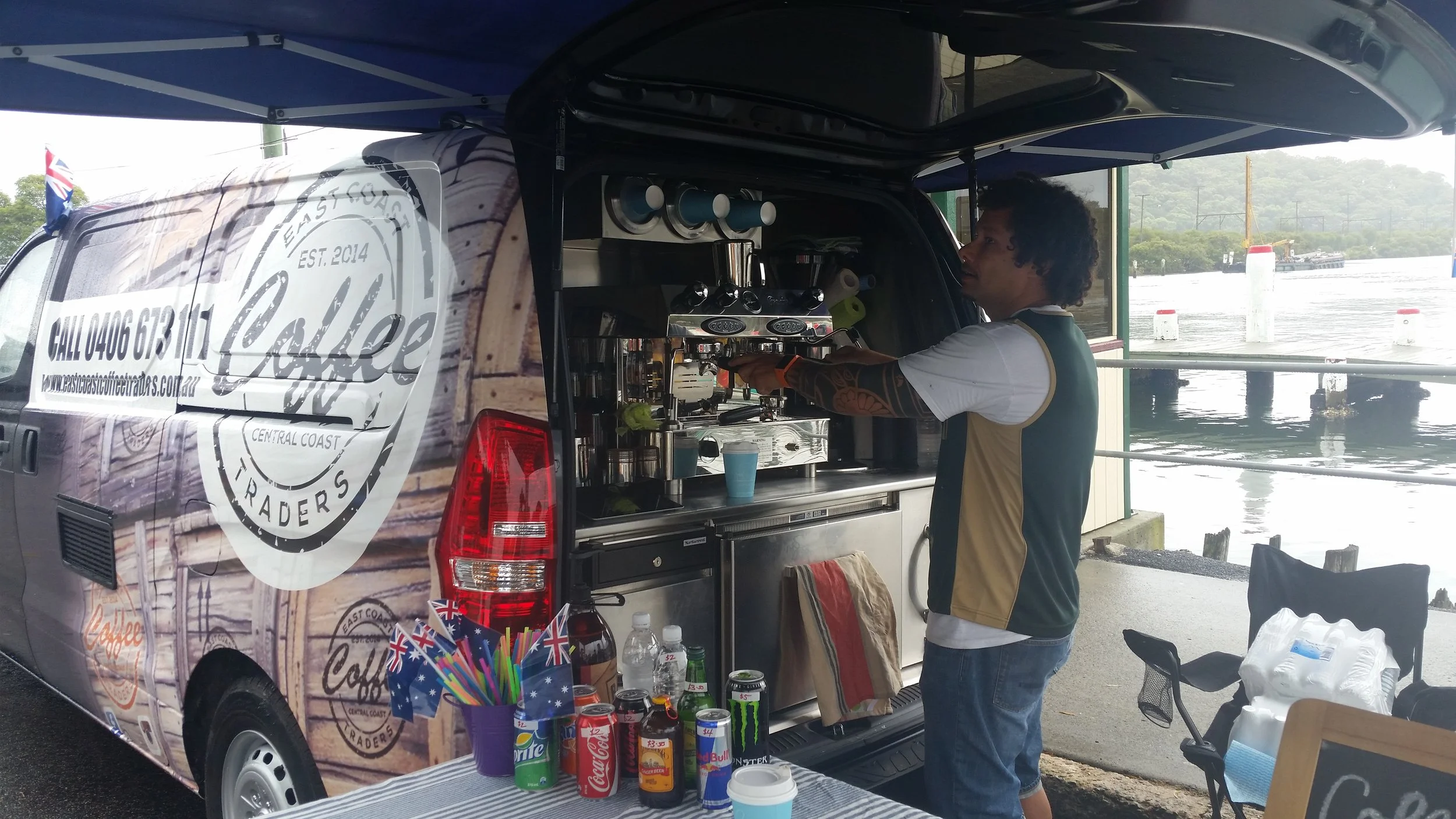 Joseph Suguturaga-Open Back serving.jpg