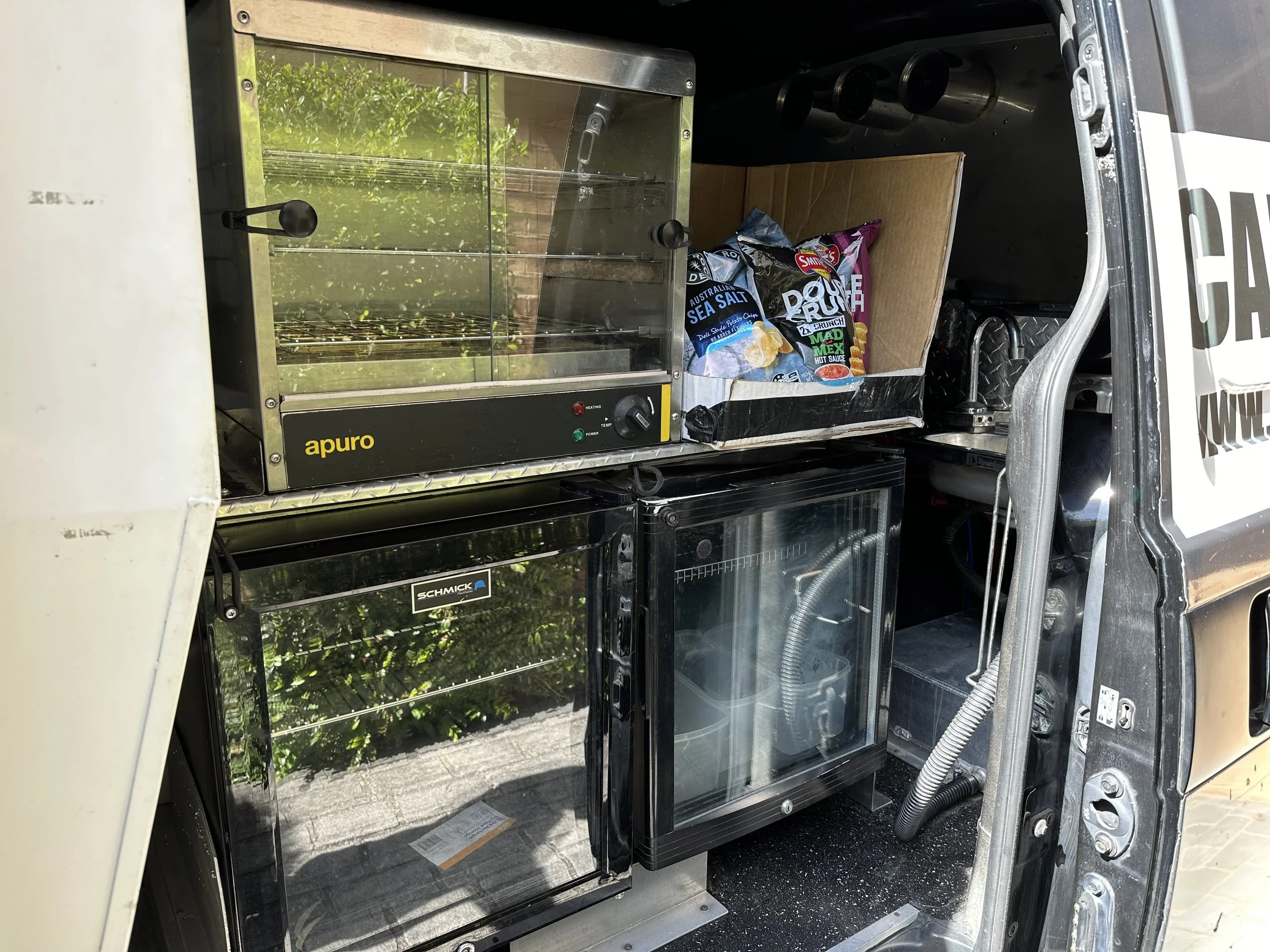 Joseph Suguturaga-Pie warmer & fridges.jpg