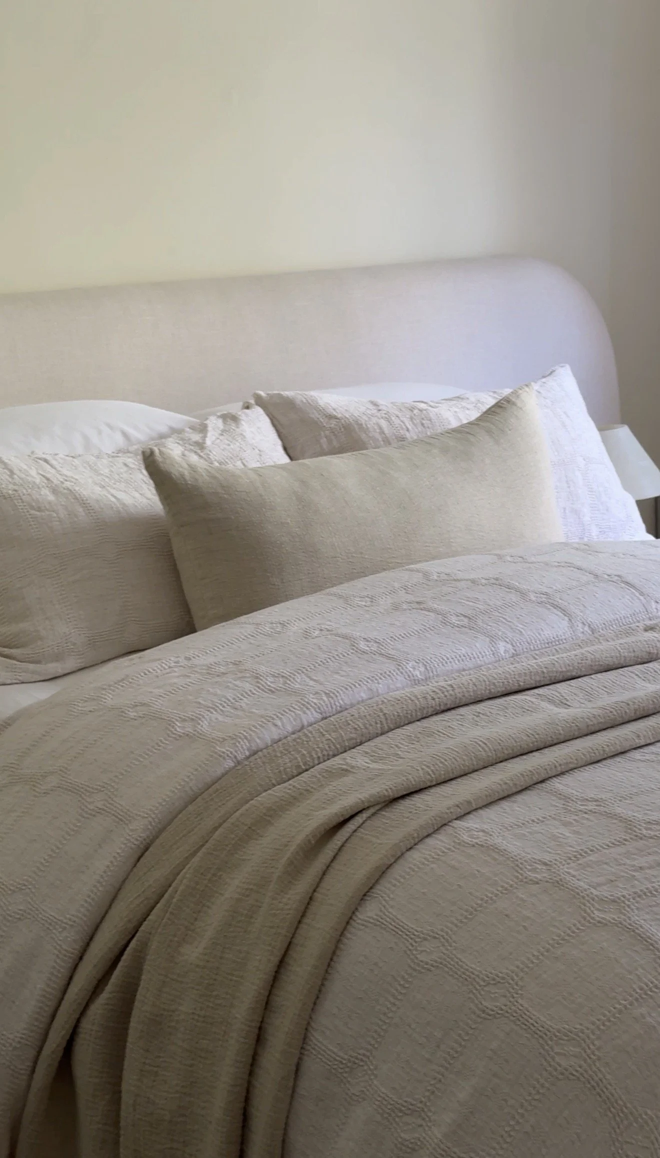 How to Style a Neutral Bed Without It Looking Boring