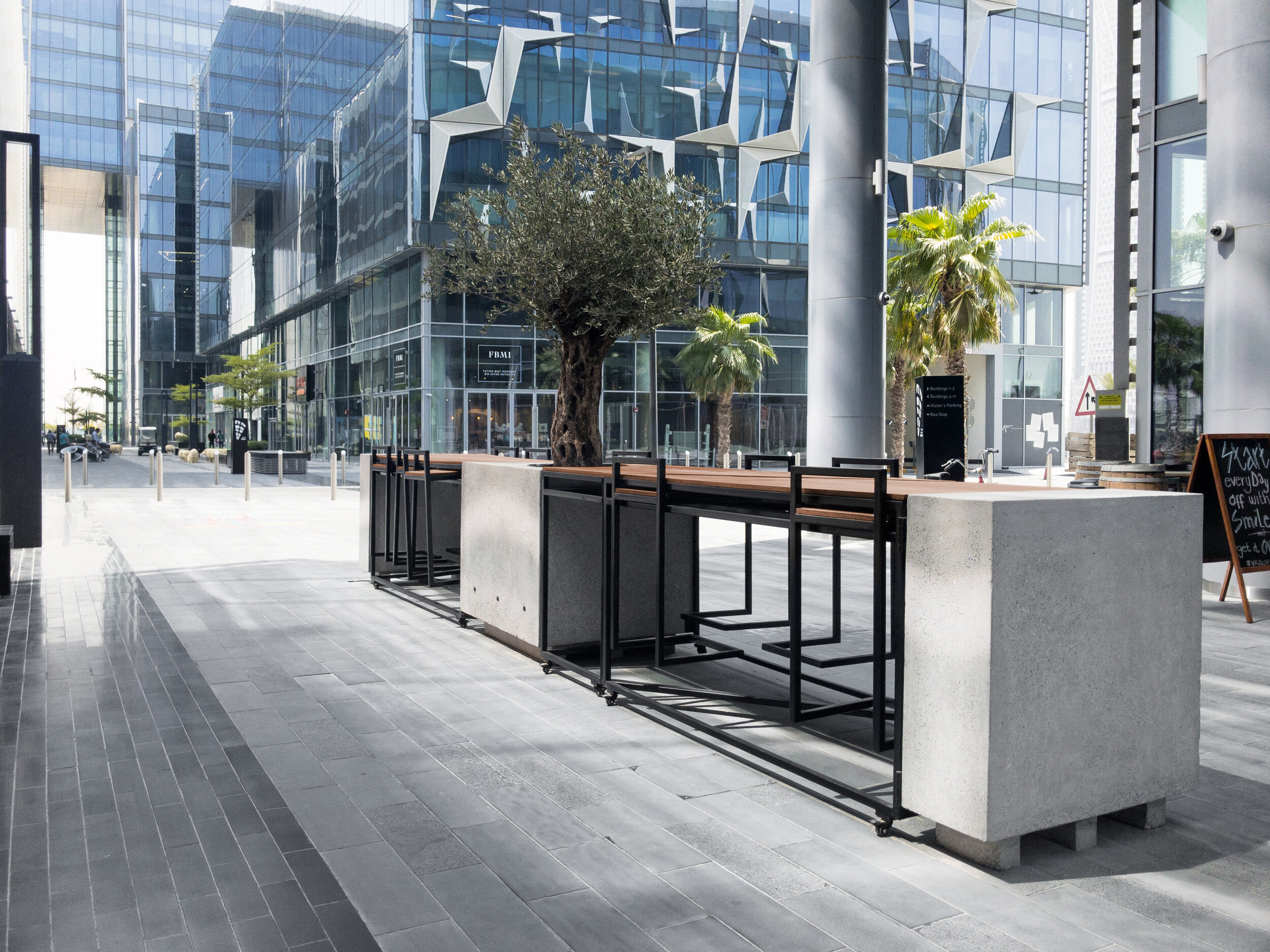 Mu.Table concrete volumes and metal frames