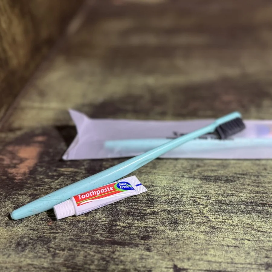 Toothbrush & toothpaste: $1.00 