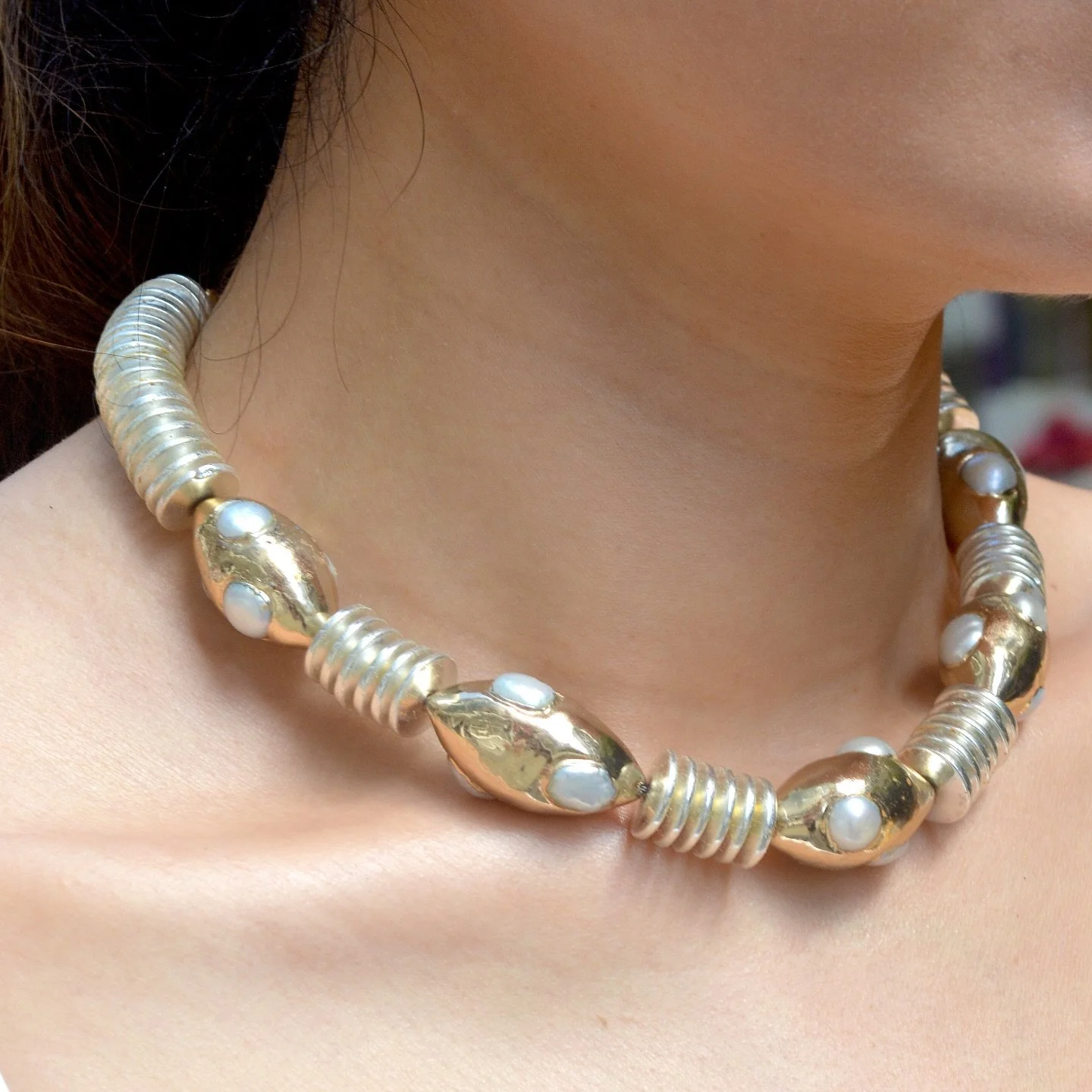 The Ceto Necklace is the ultimate summer statement &mdash; mirror-plating to catch the sunlight, with delicate freshwater pearls that evoke the beauty of the ocean.

#CarolinaWong #summerjewellery #handmadejewellery #sustainable #summerstyle #London 