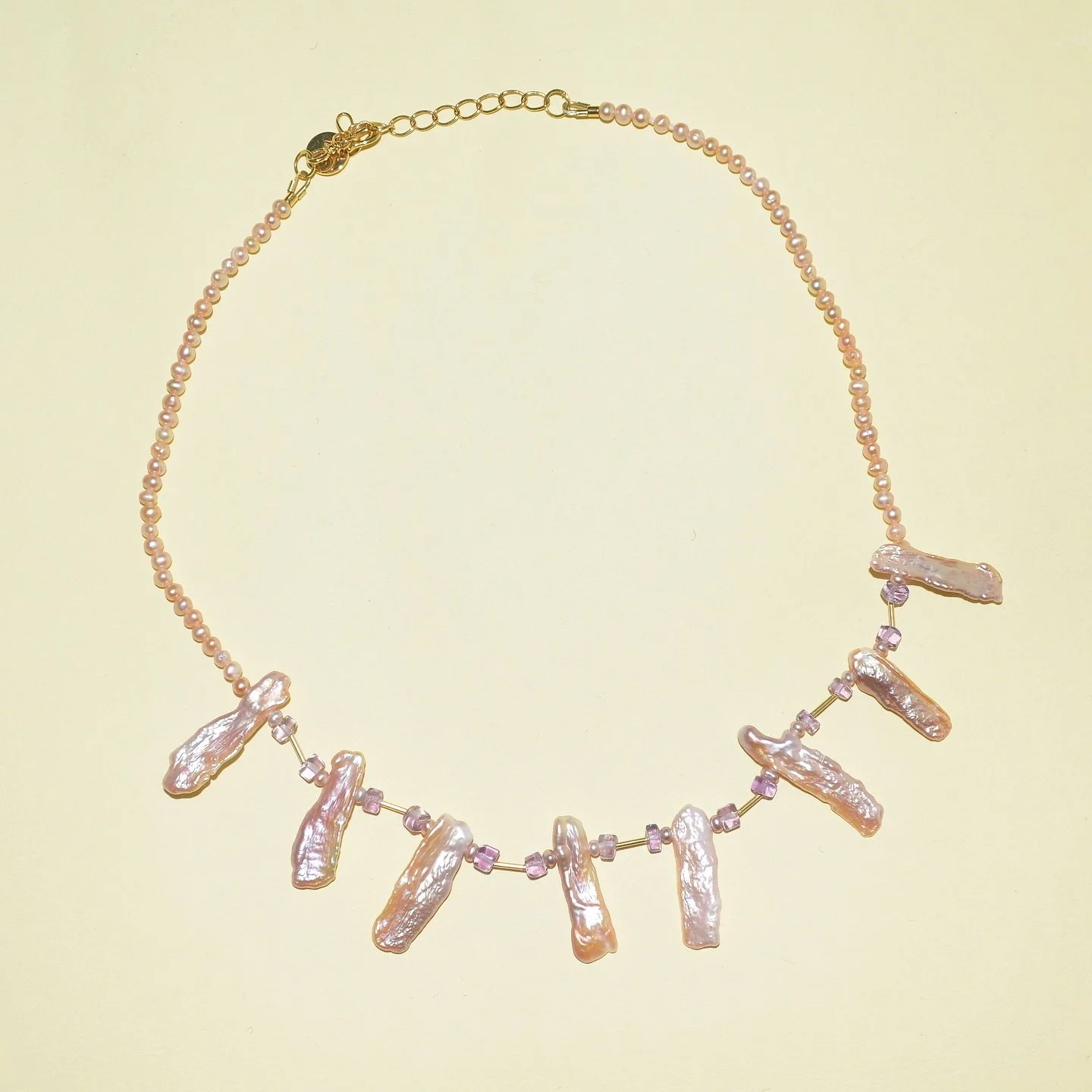 The Keshi Necklace pairs uniquely shaped baroque pearls with radiant amethyst, highlighting its rich purple hues and natural iridescence.

#CarolinaWong #autumnjewellery #handmadejewellery #sustainable #autumnstyle #winterstyle #London #sustainableje