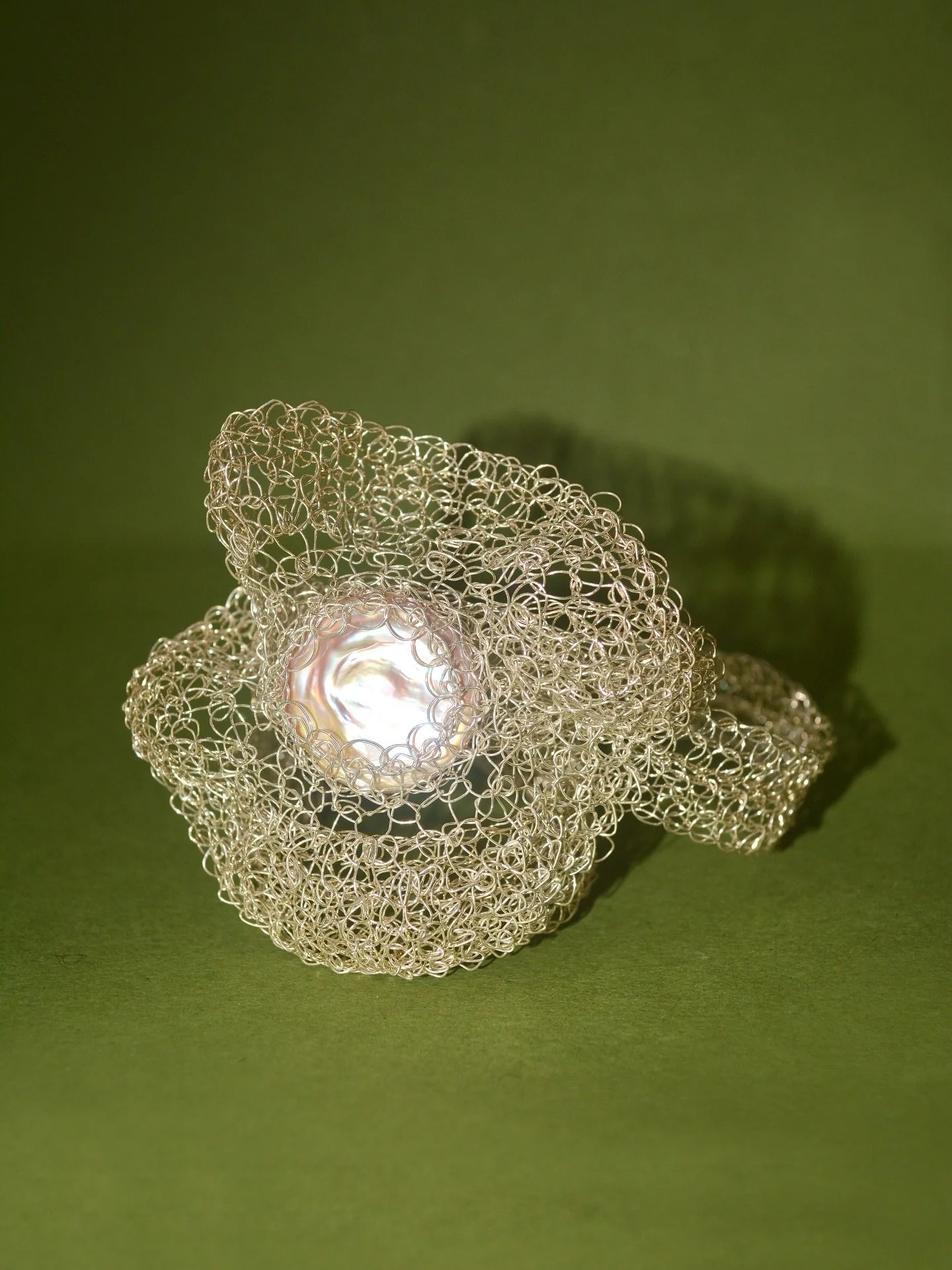 Flora captures the essence of flowers with delicately hand-crocheted wire, finished with a shimmering baroque freshwater pearl.

#CarolinaWong #autumnjewellery #handmadejewellery #sustainable #autumnstyle #winterstyle #London #sustainablejewellery #f