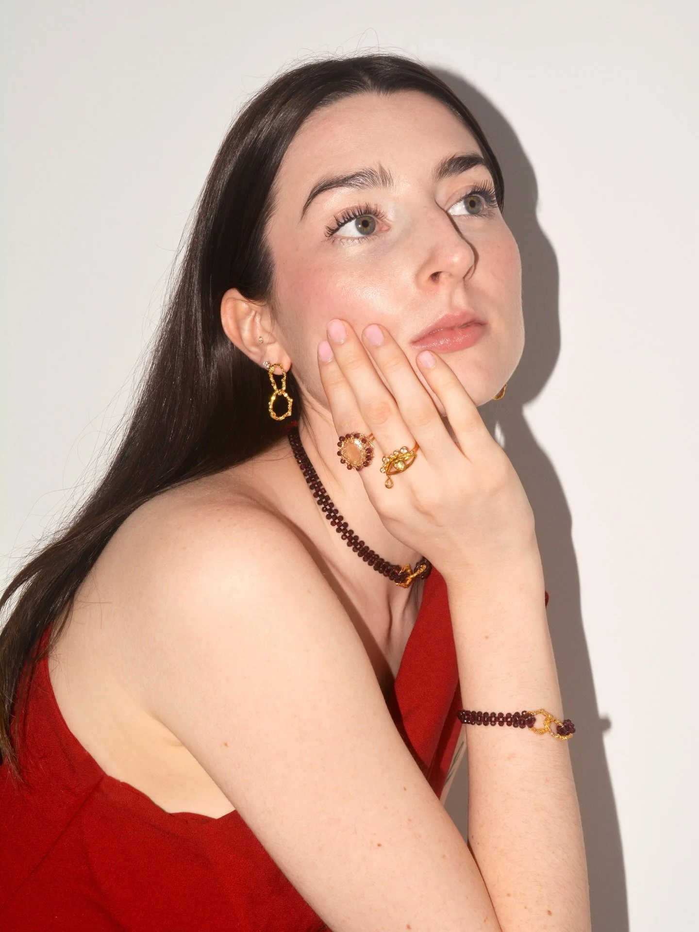 Garnet and gold, perfectly layered! Mix and match our collections to build your perfect stack - from the warmth of garnet to the cool glow of terahertz.

#CarolinaWong #autumnjewellery #handmadejewellery #sustainable #autumnstyle #winterstyle #London