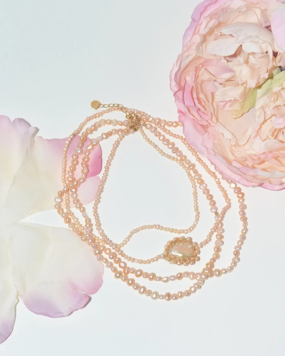 A delicate pink glow, captured in our Freshwater Pearl Polka Multilayer Necklace.

#CarolinaWong #handmadejewellery #sustainable #winterstyle #London #sustainablejewellery #winterfashion #cozyseason #winterootd #winterglam #pearl #handmade #pink #flo