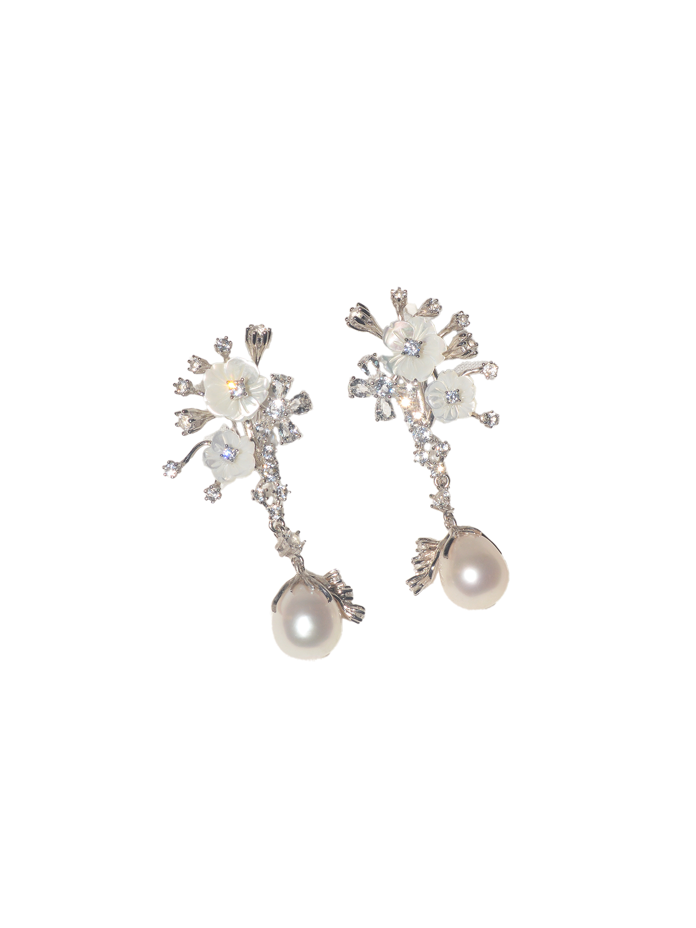 snowy bloom pearl drop earrings.png