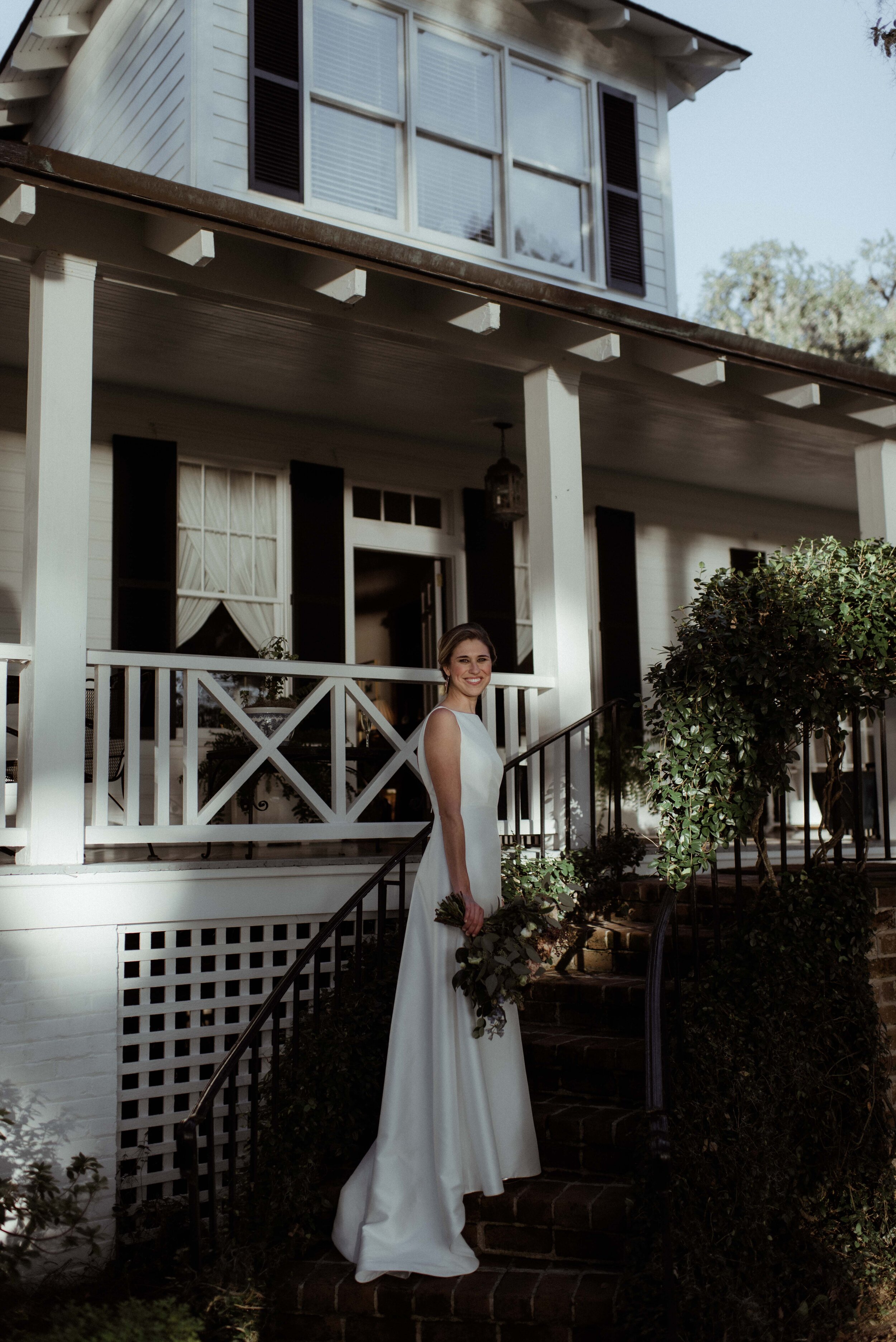 romantic-backyard-wedding-savannah-georgia-bride-on-step.jpg