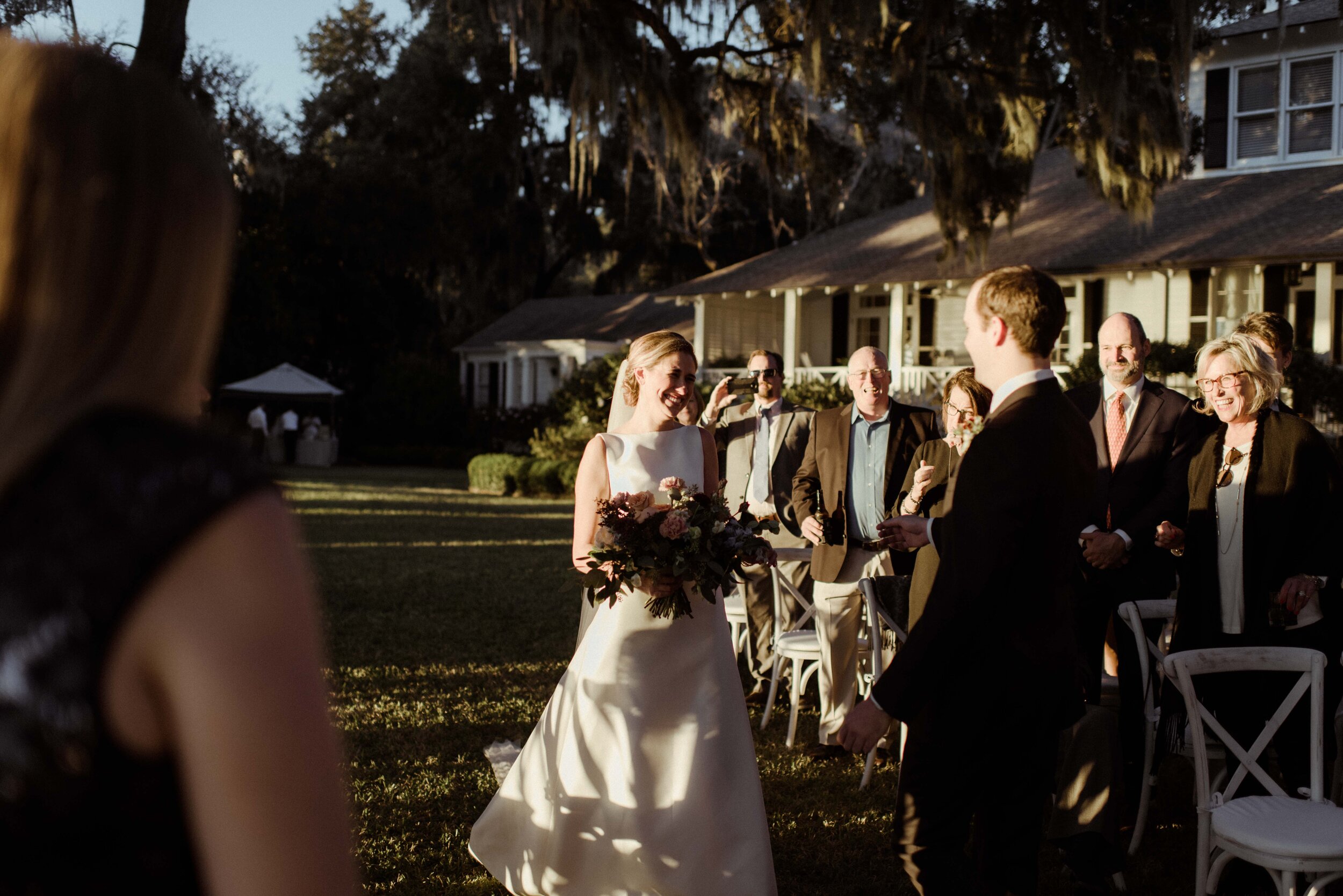 romantic-backyard-wedding-savannah-georgia-bride-walks-up-aisle.jpg