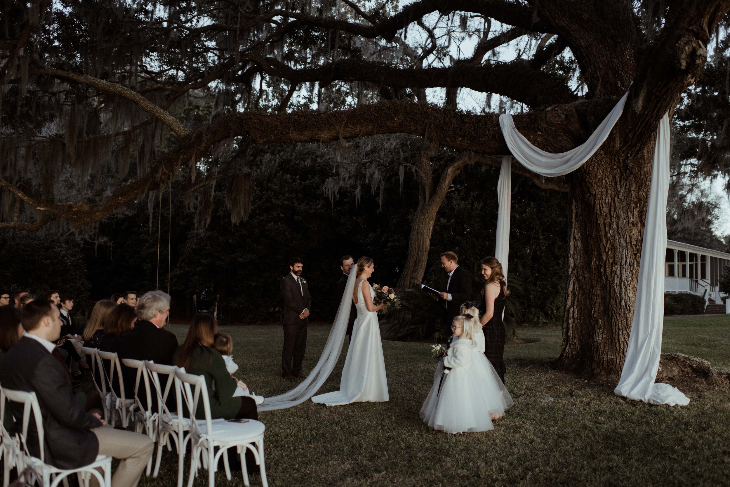 romantic-backyard-wedding-savannah-georgia-bride-smiles-at-family.jpg
