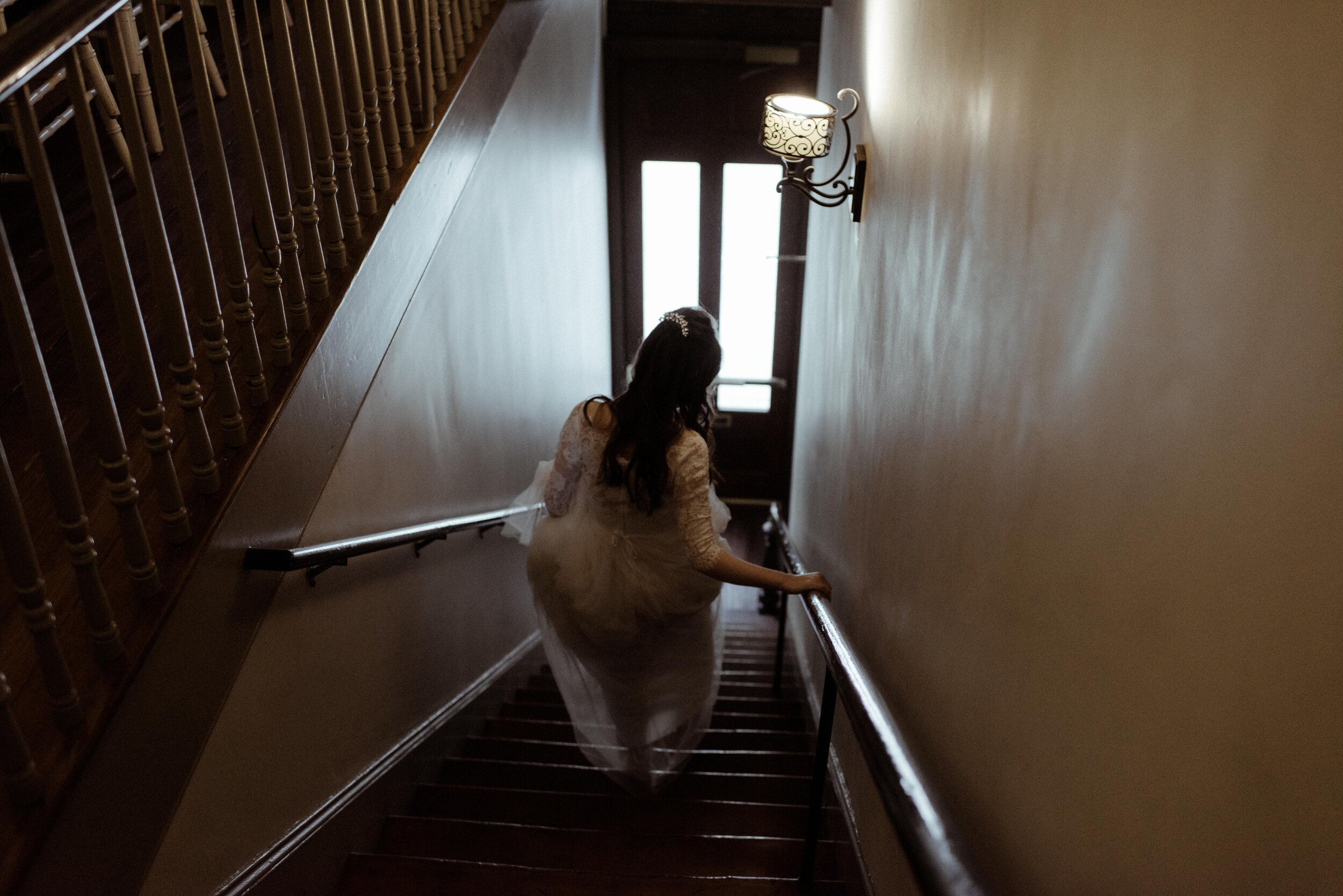 bride-on-stairs-10-downing-savannah.jpg