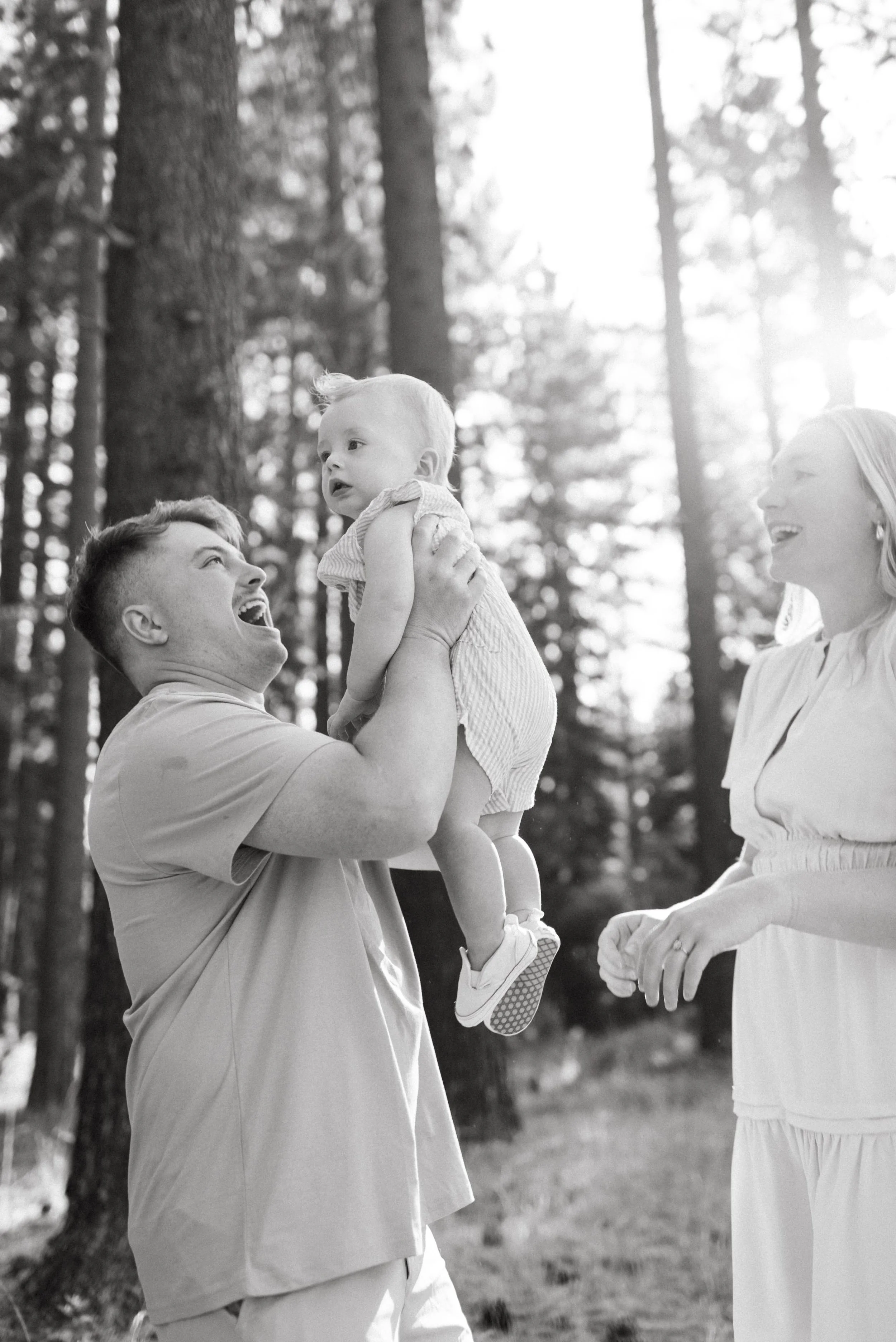 dad-holds-son-at-family-session-skylandia-beach-lake-tahoe.jpg