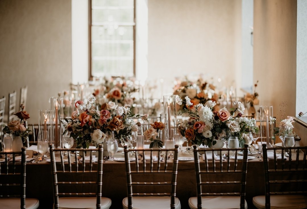 A huge mistake couples and florists make is having centerpieces that are too big for the size of the tables, especially rectangular ones that are only 30&quot; or 36&quot; wide.  Perfectly scaled floral arrangements are important when tables are narr