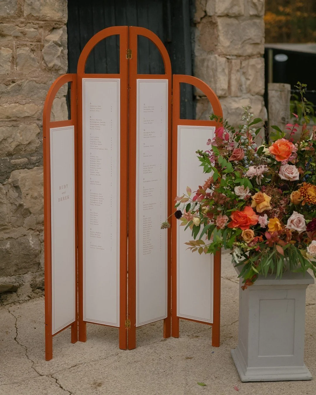We turned an old screen divider into a one-of-a-kind seating chart and it was the perfect fit for the day! Its vintage charm felt right at home in the space, especially since Ruby&rsquo;s mom has such a love for collecting antiques. We added statemen